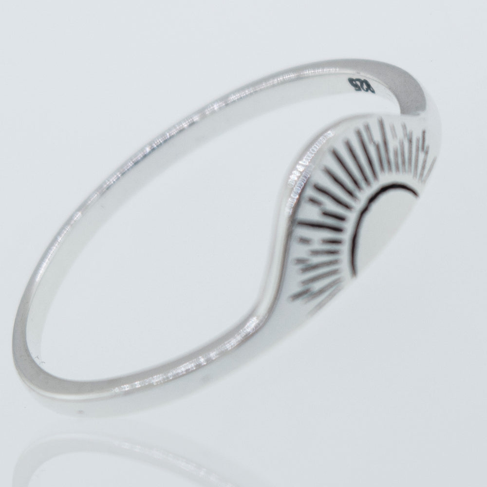 A Super Silver Sunrise Ring, made of 925 sterling silver and featuring a sunburst design, with a high shine finish.