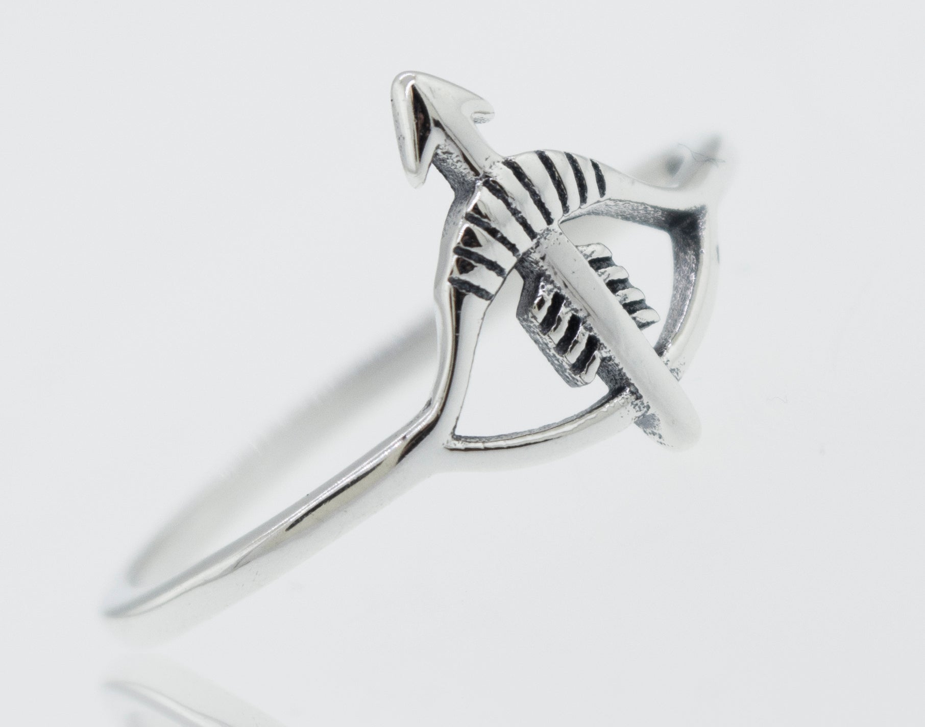 A high polish Super Silver Bow and Arrow Ring with a bow and arrow design.