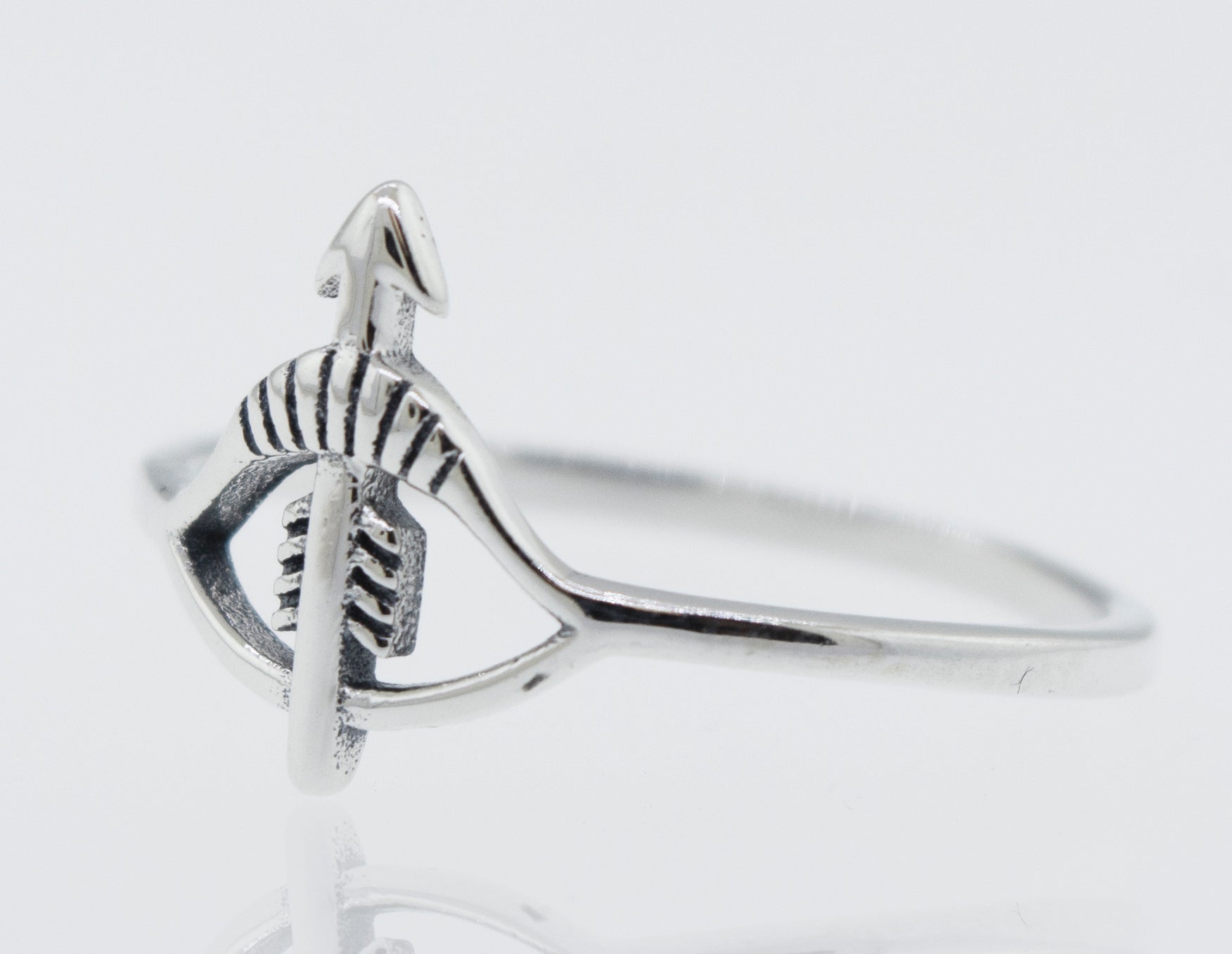 A Bow and Arrow Ring from Super Silver, made with 925 sterling silver and a high polish finish, featuring a subtle bow and arrow design.