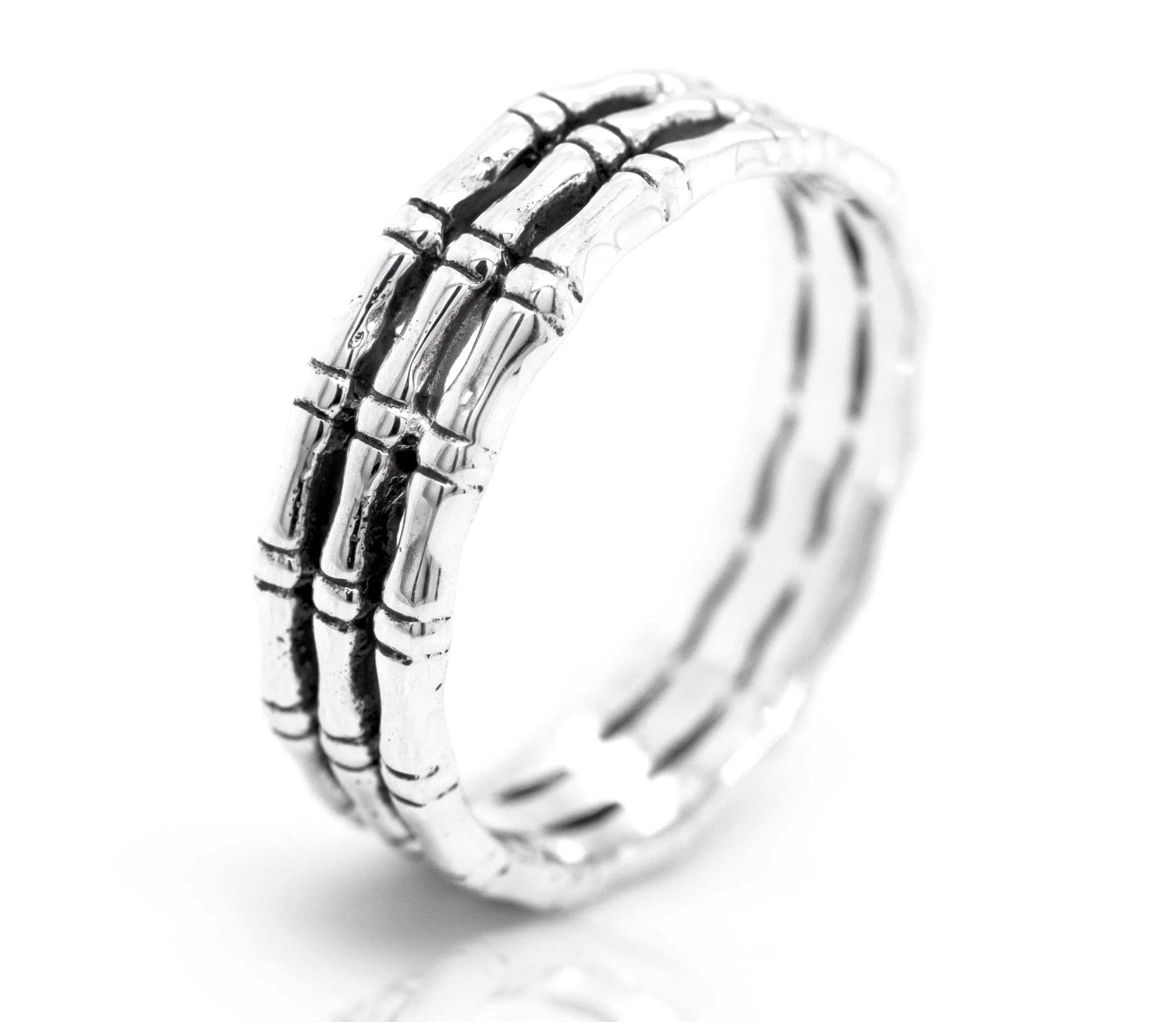 A Triple Bamboo Band Ring with a bamboo design, from Super Silver.