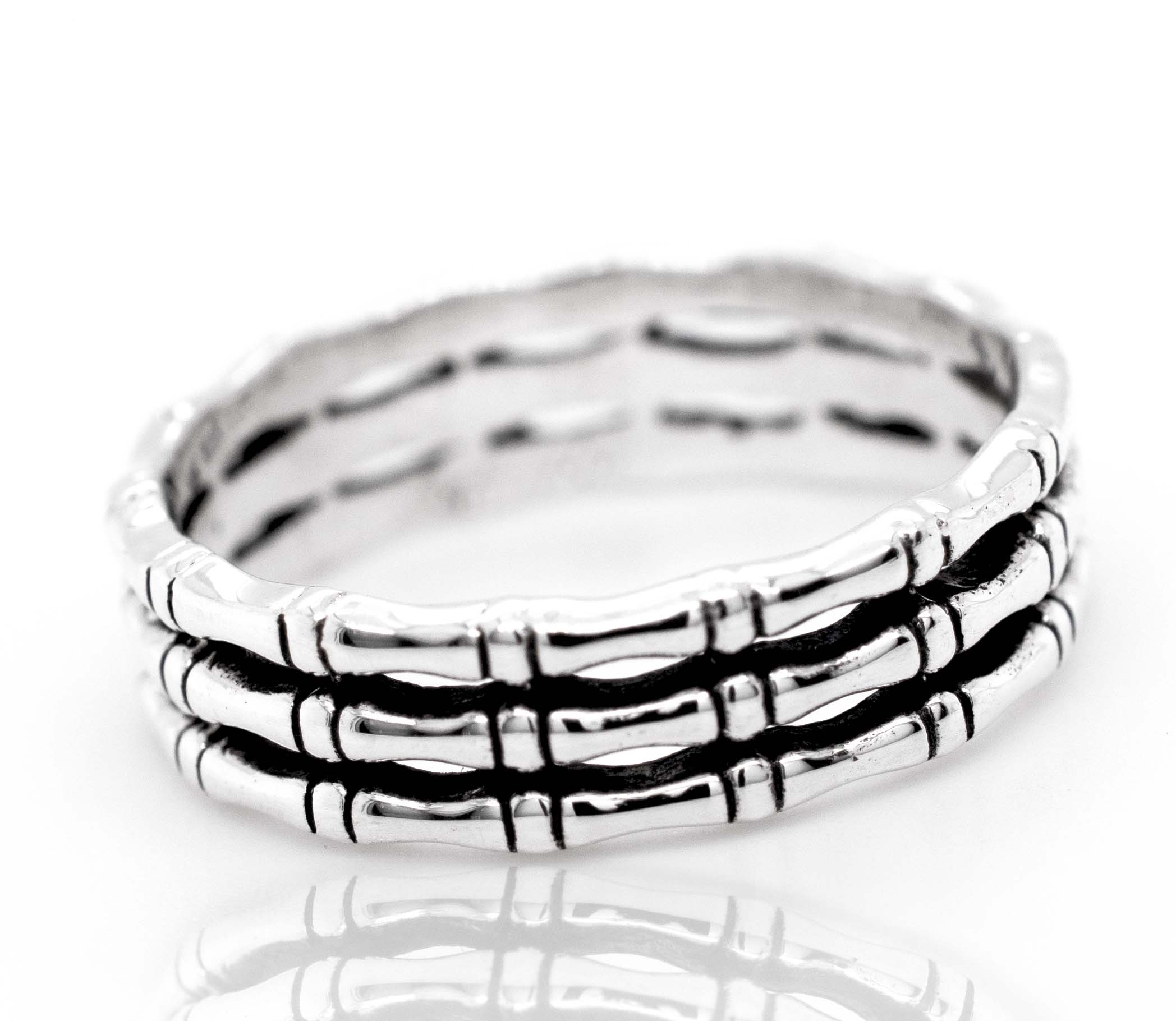 A minimalist style Super Silver Triple Bamboo Band Ring.