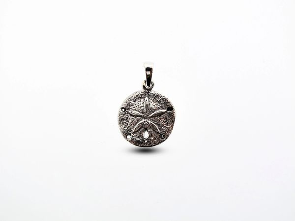 A Super Silver Small Sand Dollar Pendant on a white background, perfect for any beach lover.