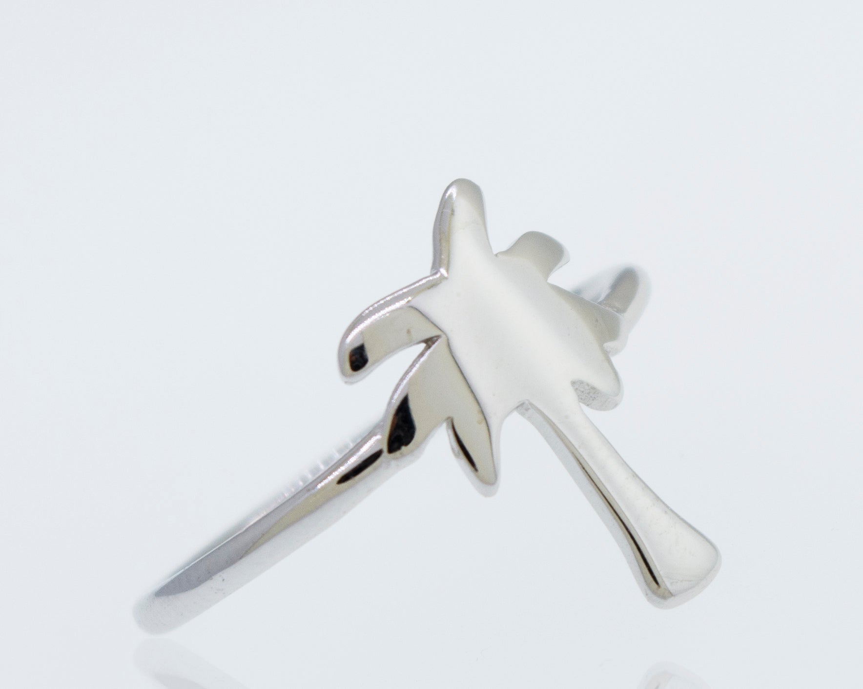 A minimalist silver Palm Tree Ring.
