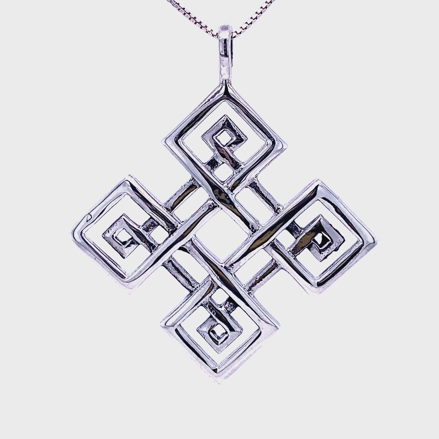 
                  
                    Load and play video in Gallery viewer, Four-Pointed Celtic Knot Pendant
                  
                