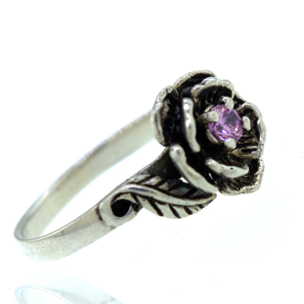 A Rose Ring with Pink CZ Stone.