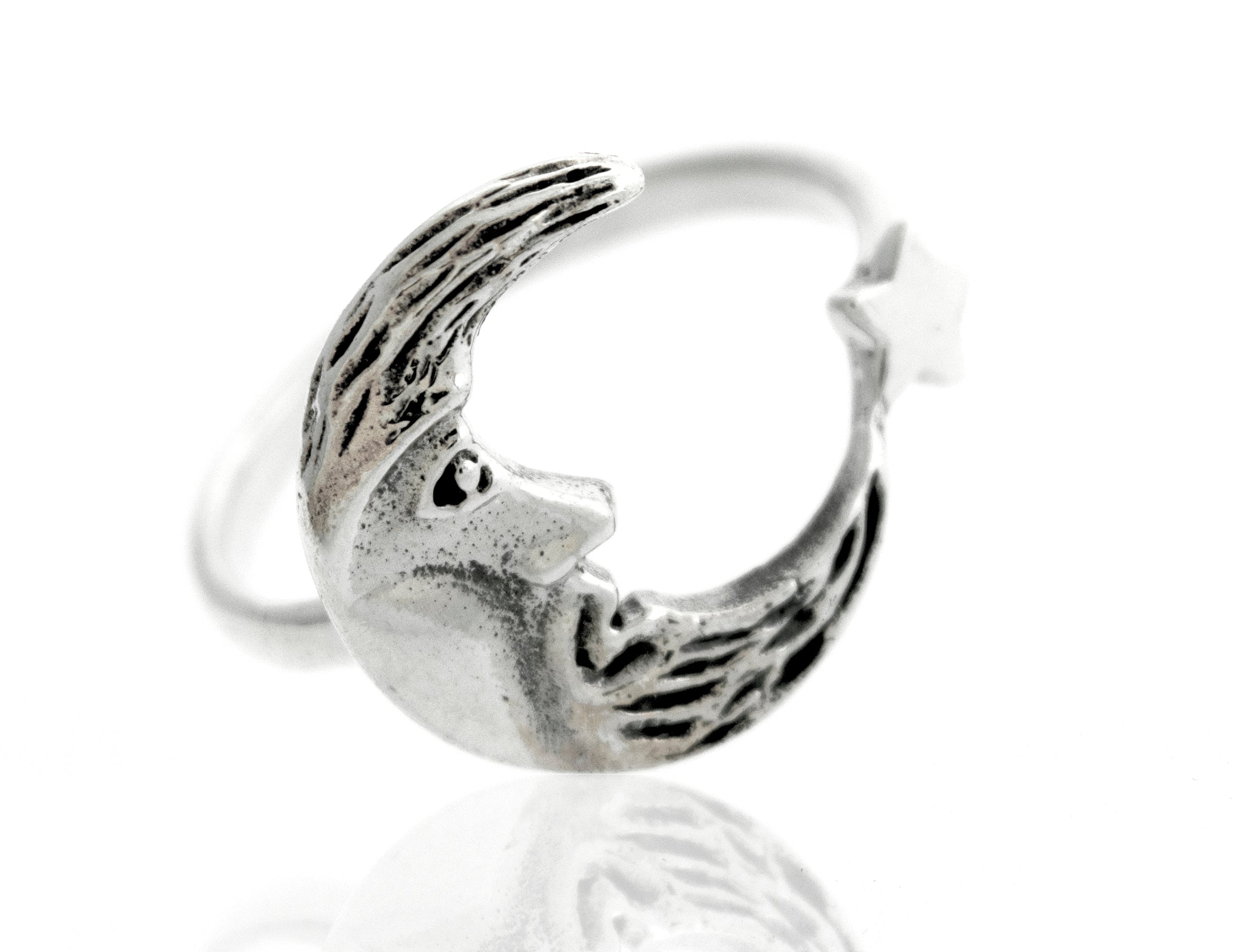 A Super Silver Crescent Moon And Star Ring.