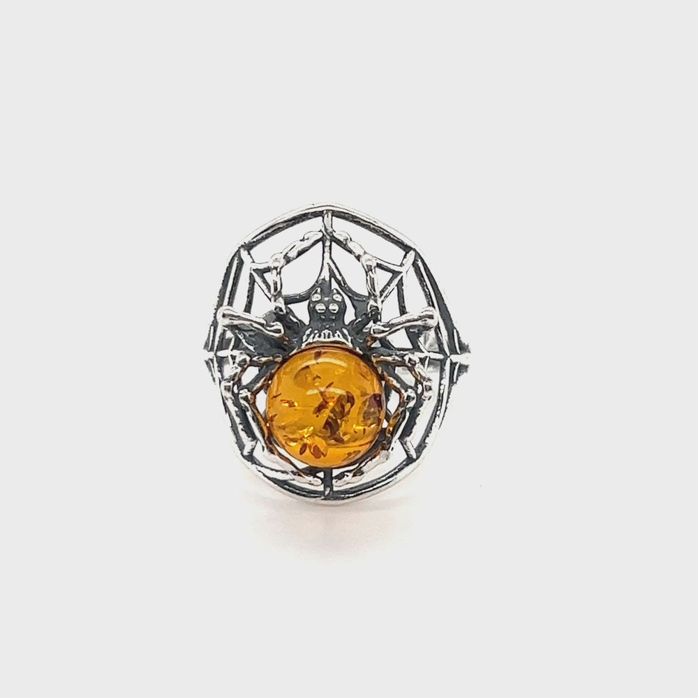
                  
                    Load and play video in Gallery viewer, Entrancing Adjustable Baltic Amber Spider Ring
                  
                