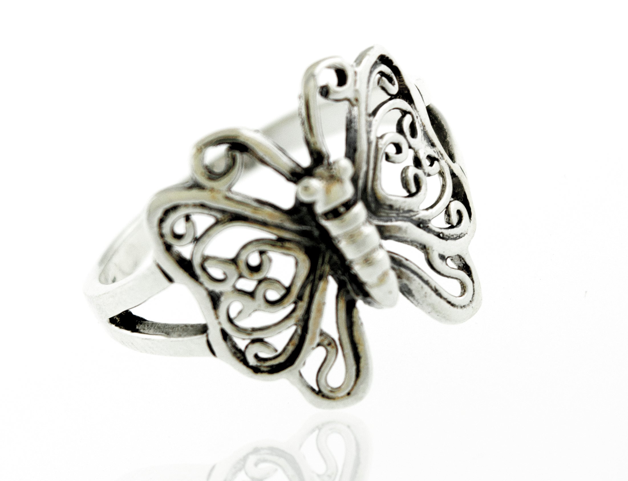 A boho silver Butterfly Ring With Filigree Design on a white background.
