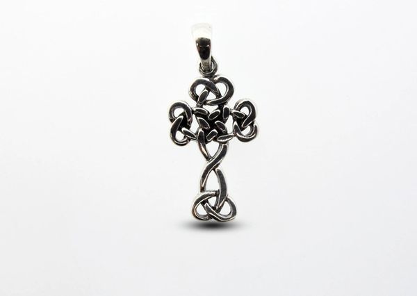 A silver Super Silver Celtic Knot Cross Pendant, featuring an intricate Celtic knot design, elegantly displayed on a pristine white background.