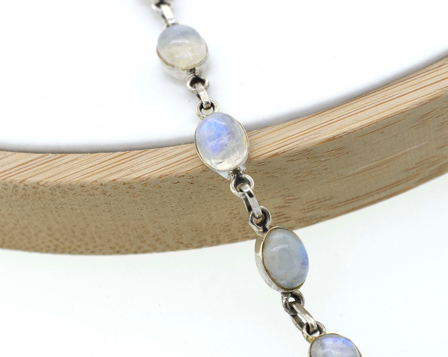 
                  
                    A Super Silver Simple Oval Gemstone Bracelet adorned with moonstones, a timeless gemstone.
                  
                