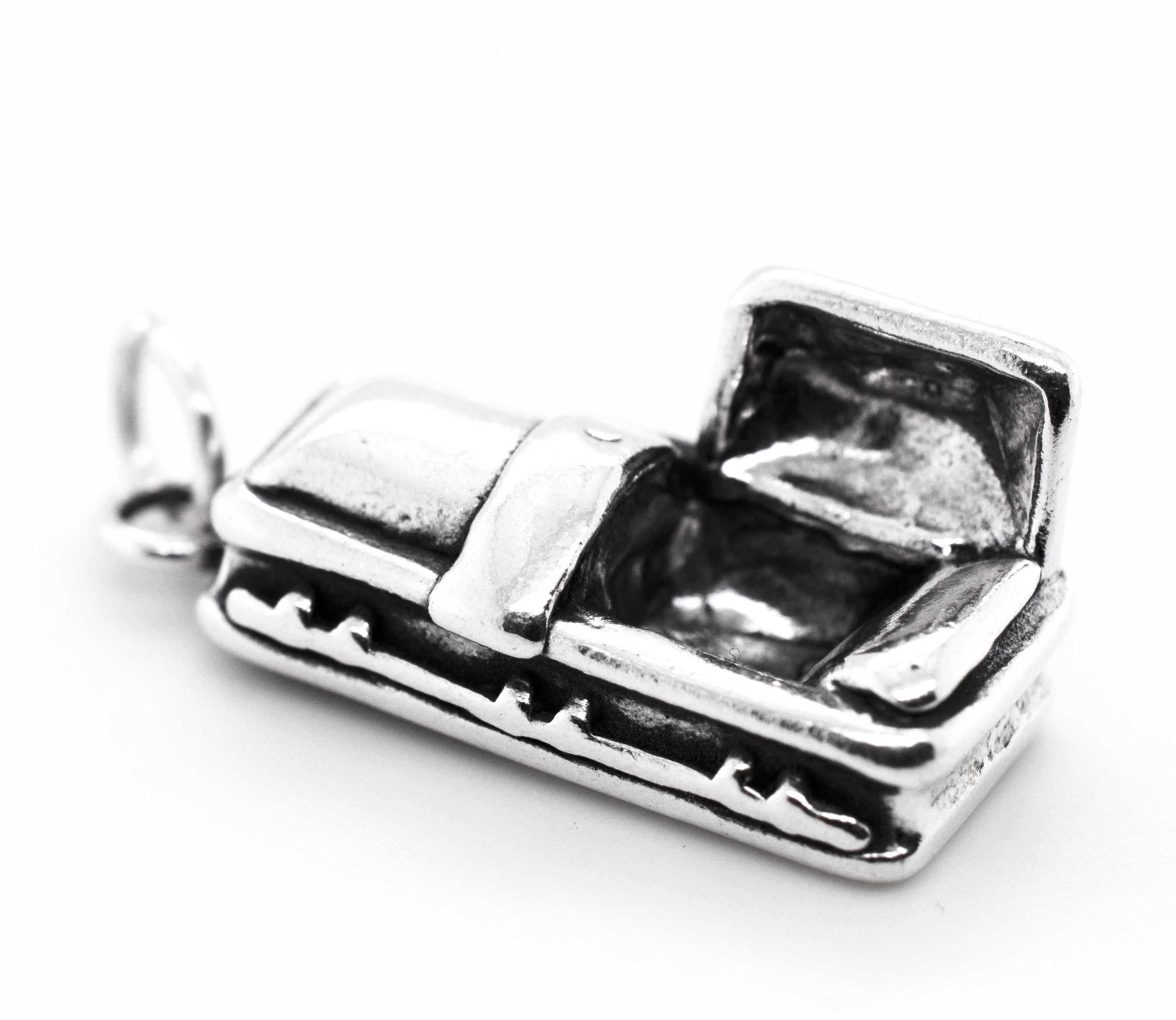 An Open Coffin charm on a white background, perfect for the Halloween season.