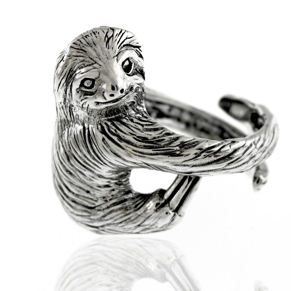 A sterling silver Detailed Sloth Ring.