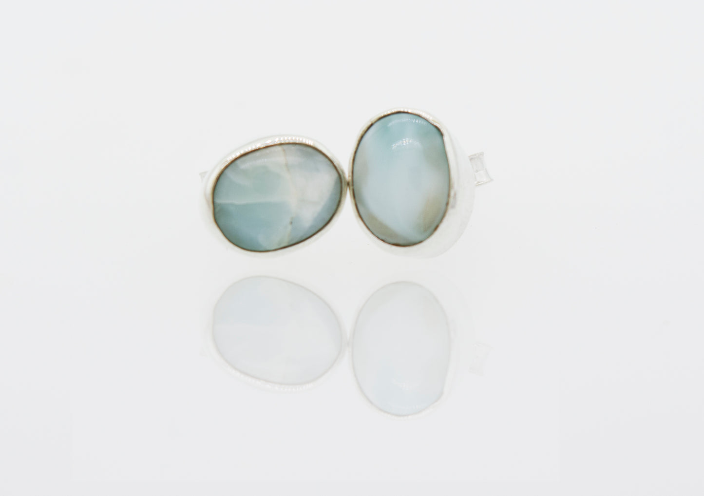 A pair of elegant Super Silver Larimar Studs with a beautiful blue stone.