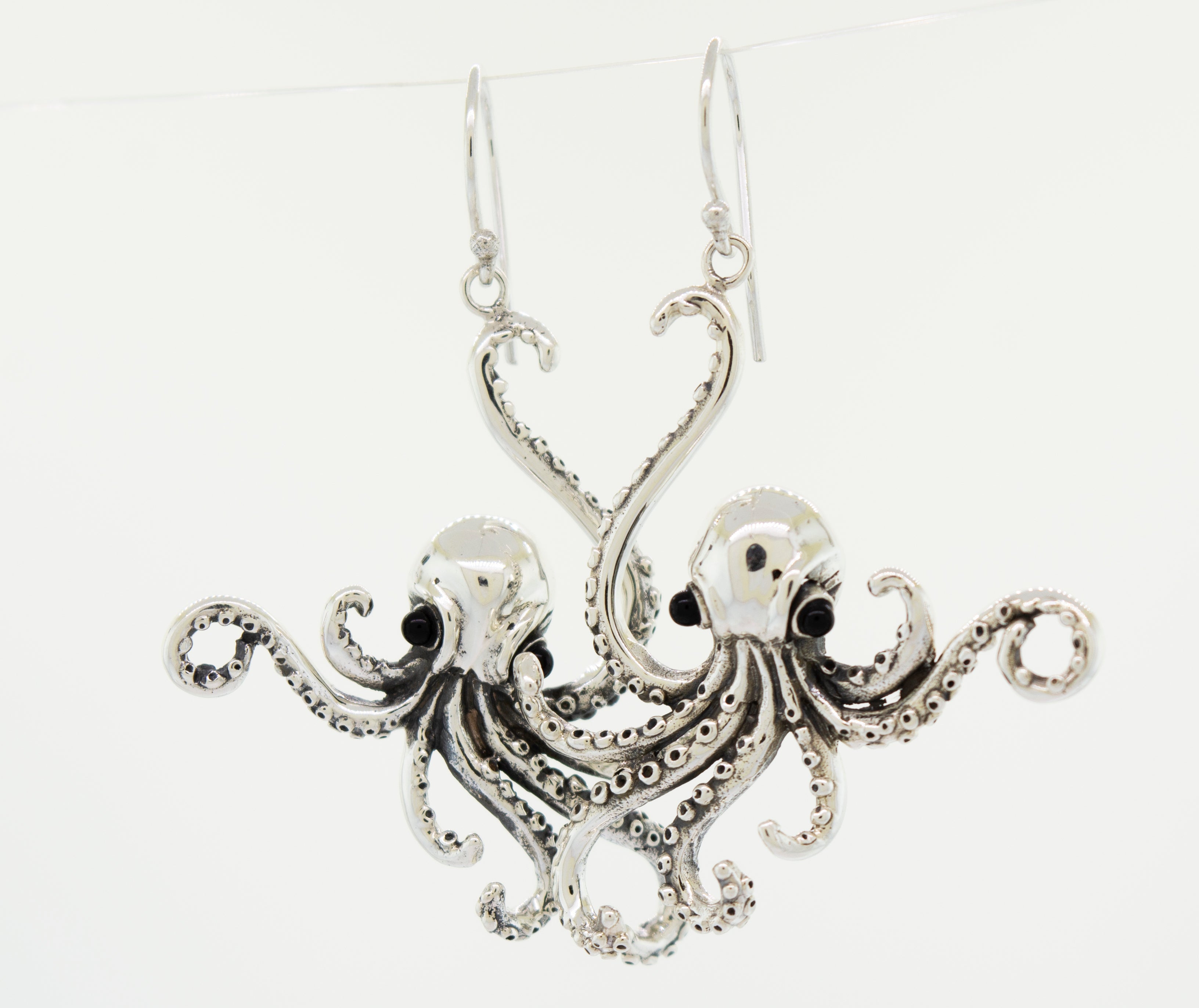 Super Silver's Designer Octopus Earring with Onyx Eyes in sterling silver.