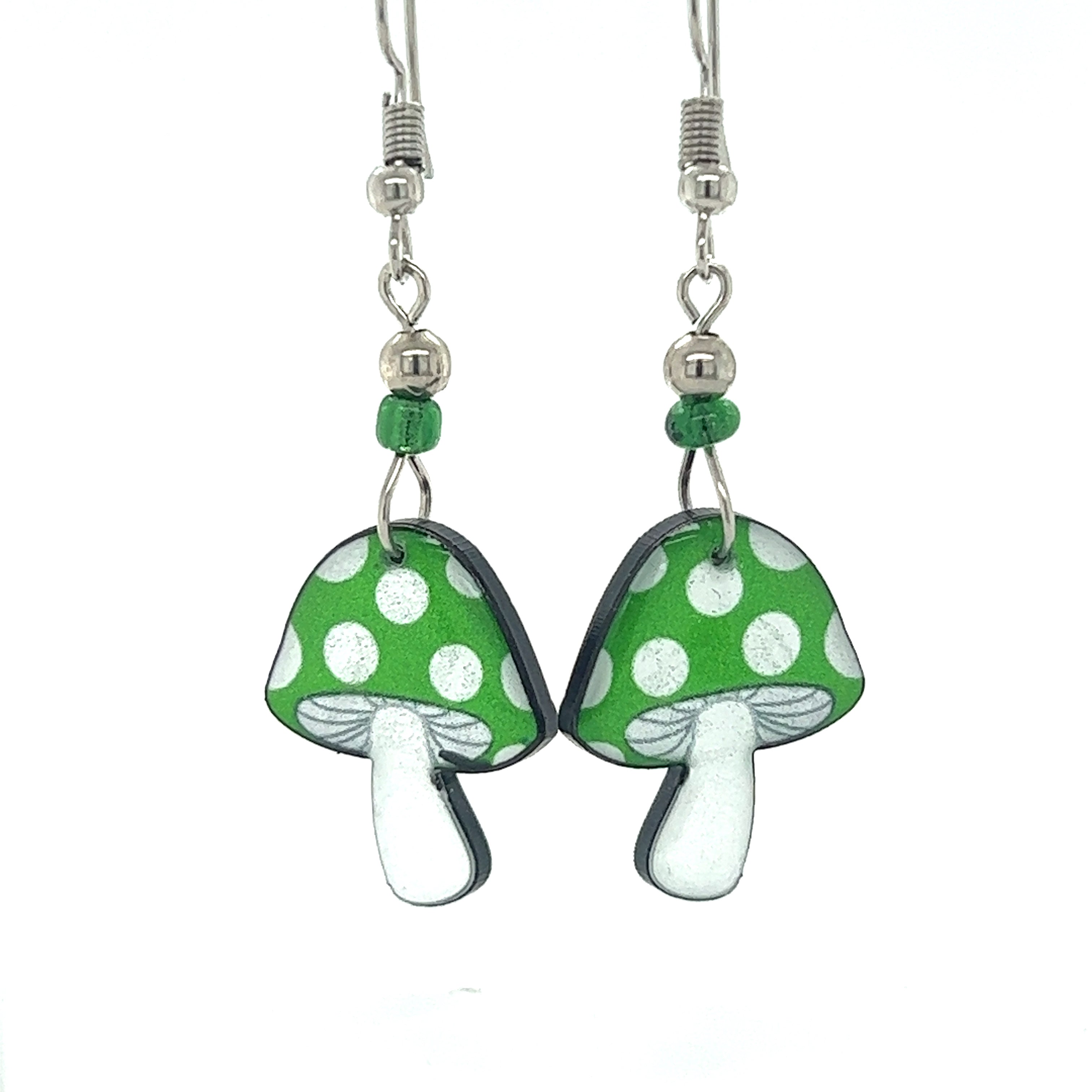 Trippy Acrylic Mushroom Earrings adorned with vibrant hues of green and white are dangle earrings from the Super Silver brand.
