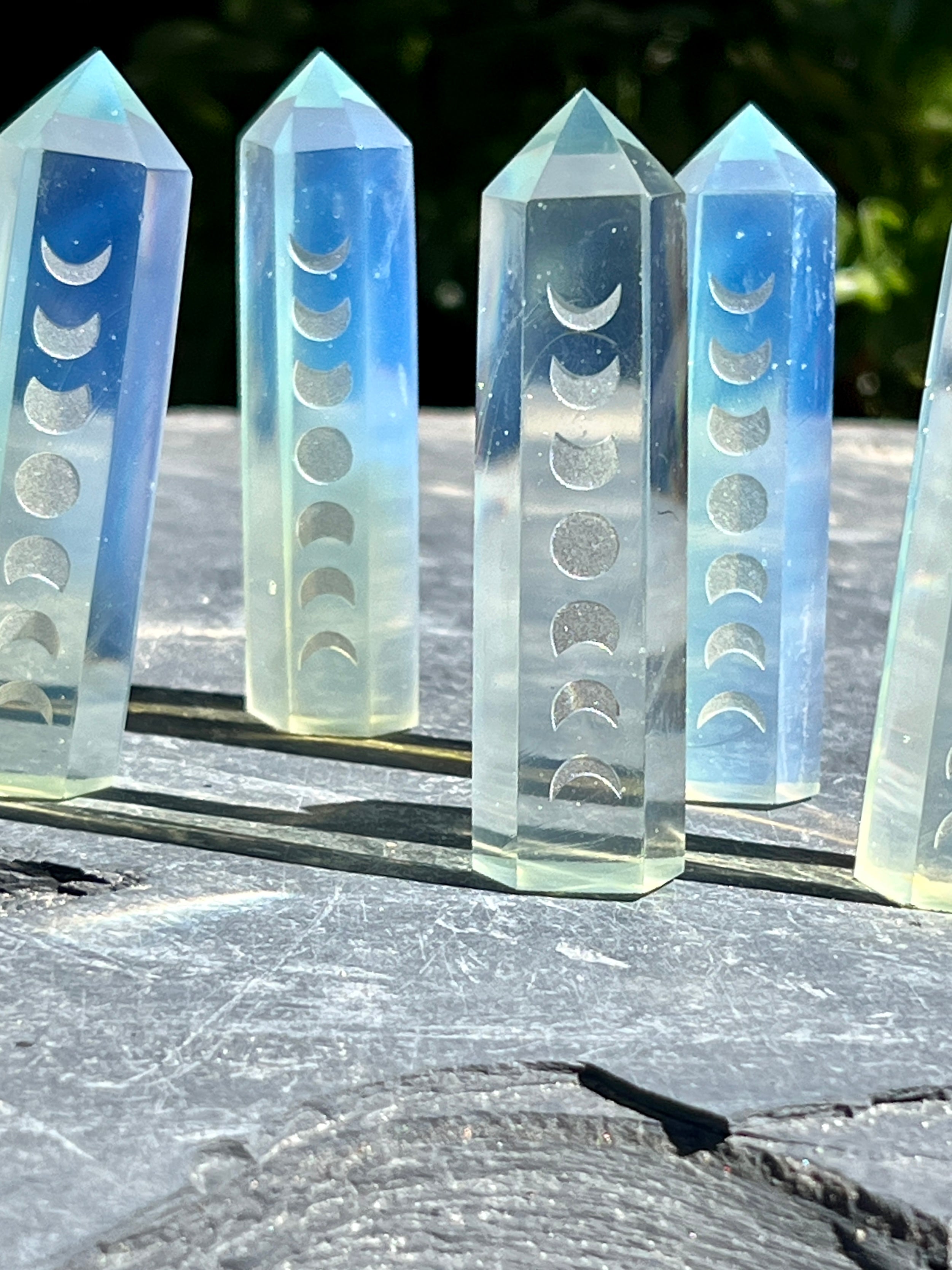 A celestial decor featuring Opalite Obelisk with Moon Phases crystals.