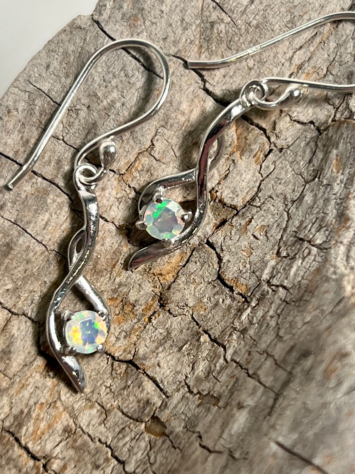 A pair of glamorous Super Silver Modern Ethiopian Opal Earrings.