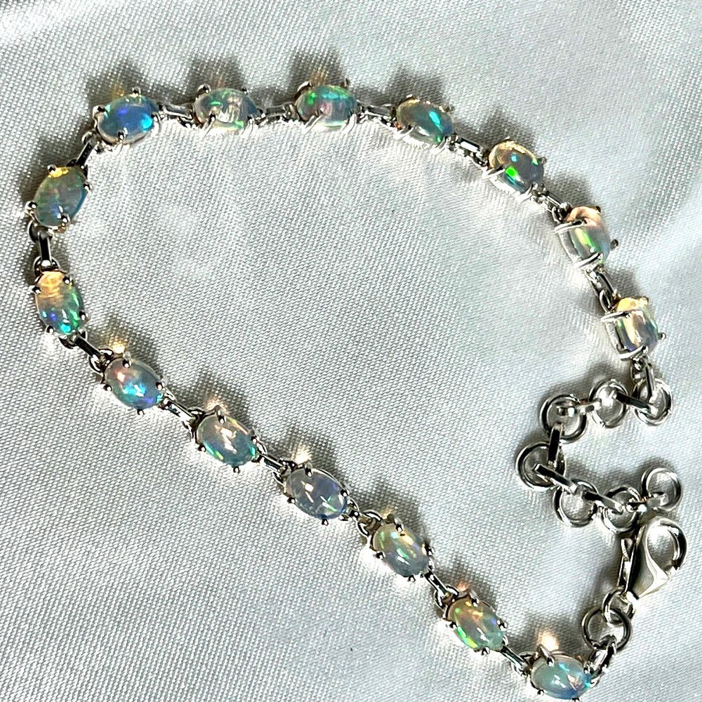 
                  
                    A glamorous Delicate Ethiopian Opal bracelet adorned with opal crystals by Super Silver.
                  
                