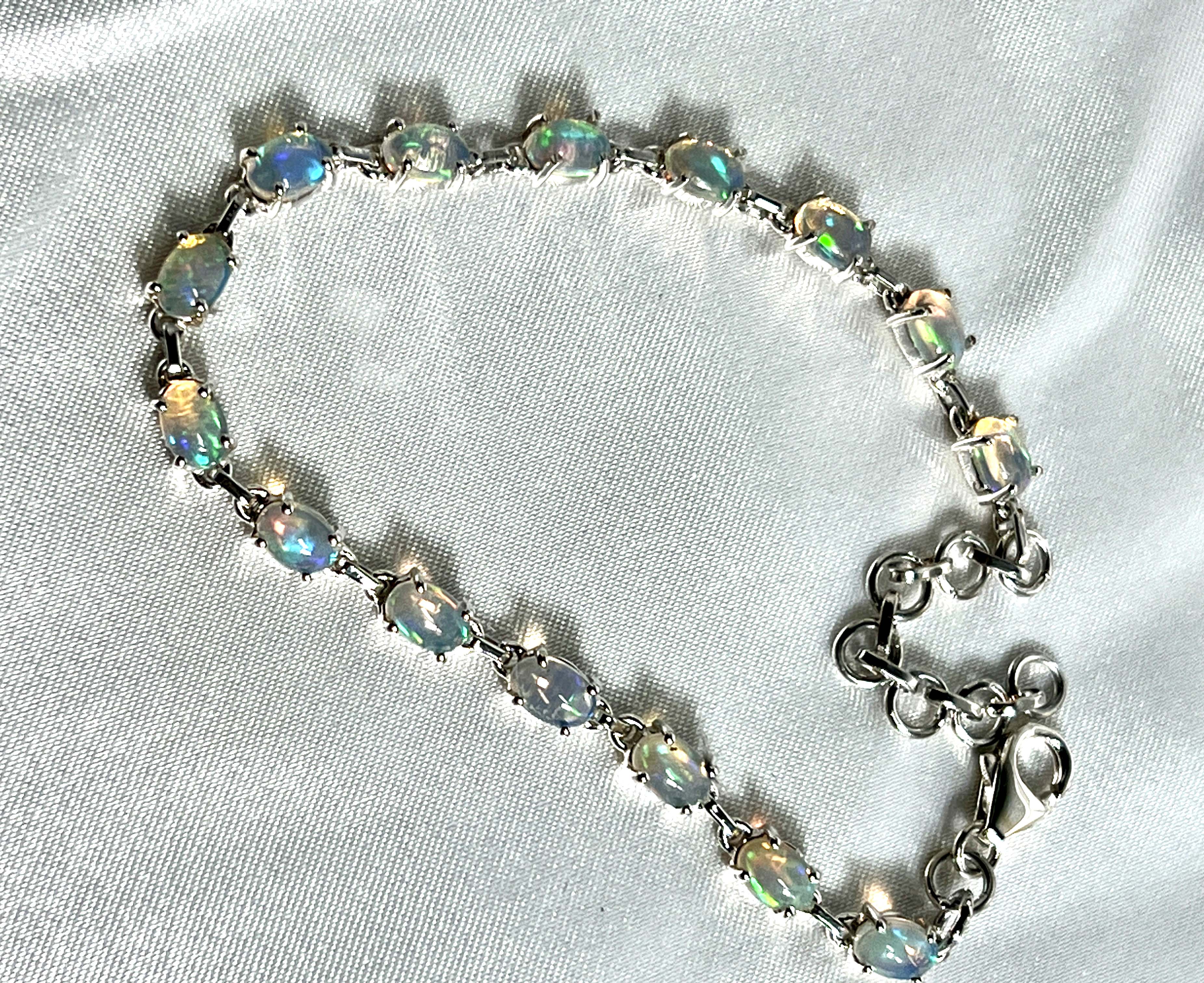 A glamorous Delicate Ethiopian Opal bracelet adorned with opal crystals by Super Silver.