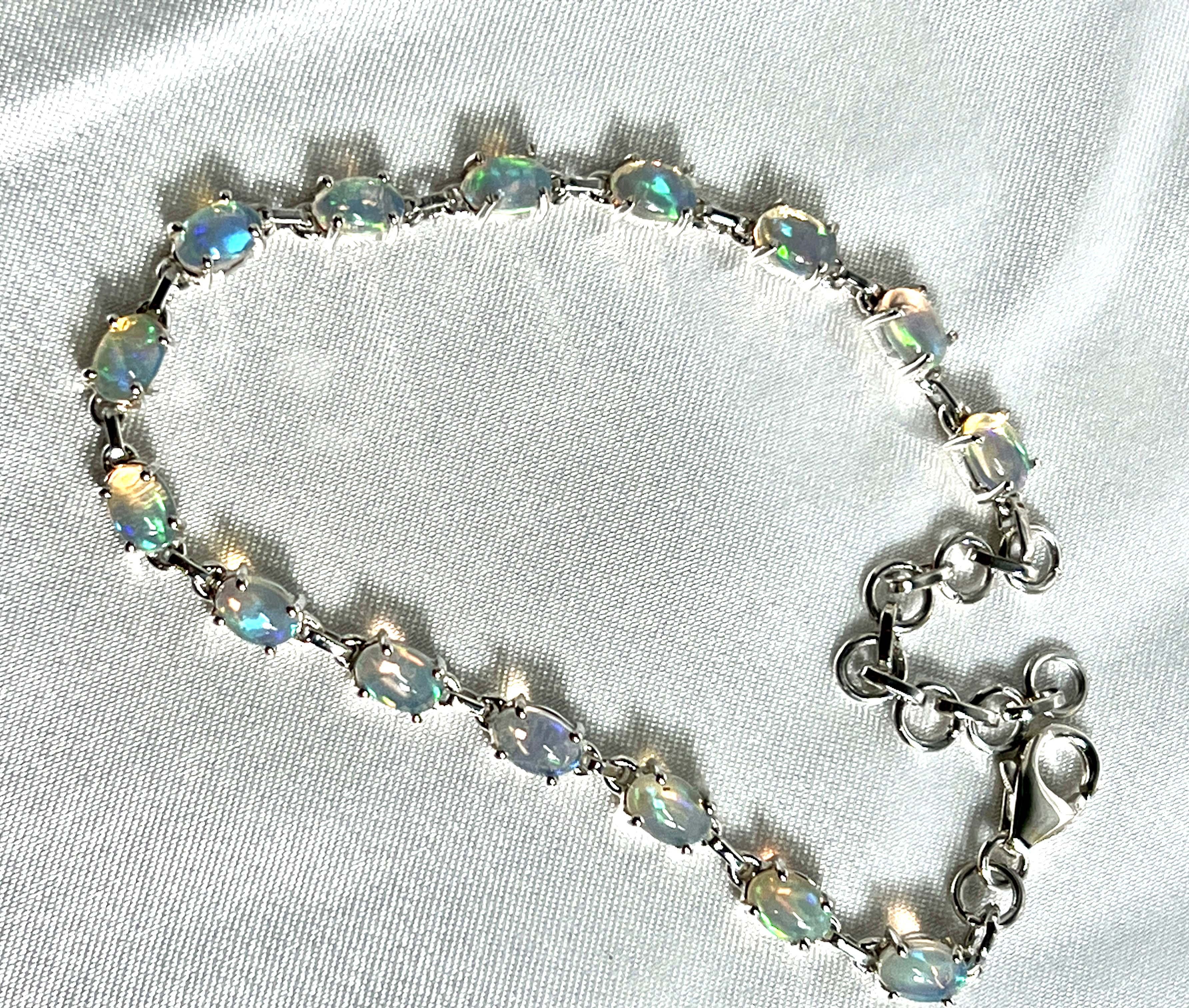 A Delicate Ethiopian Opal Bracelet adorned with Super Silver crystals, exuding glamour.