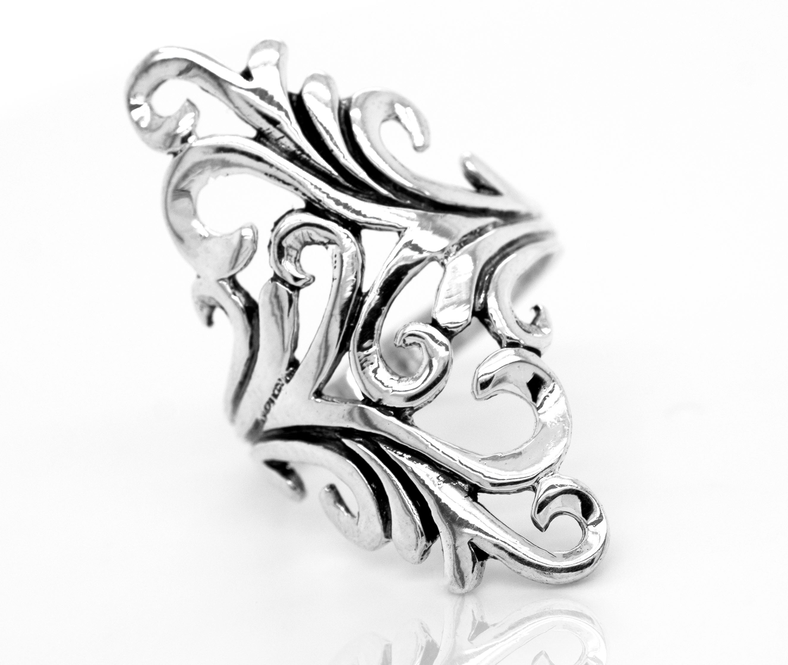 Introducing the Vintage Inspired Swirl Wrap Ring, featuring ornate silver details with intricate swirling patterns set against a simplistic white background, reminiscent of classic art nouveau design.