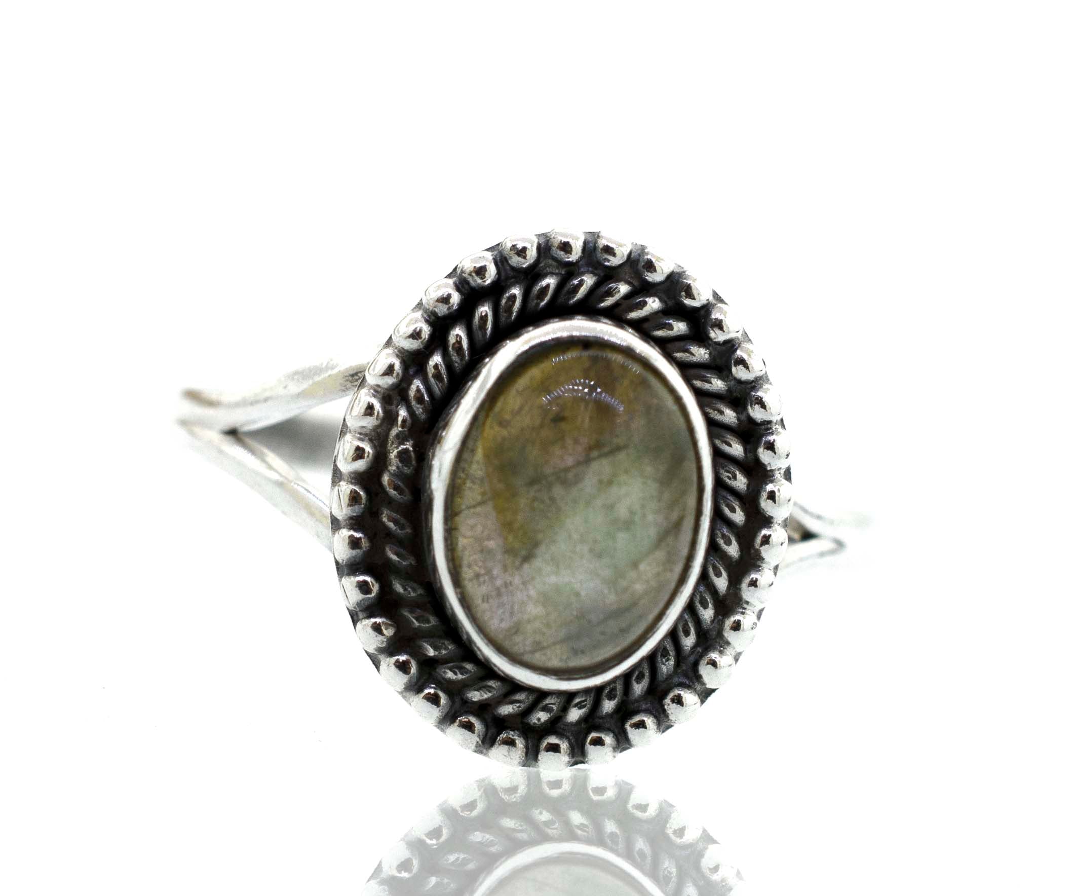 A boho silver ring with an Gemstone Oval Shield stone.