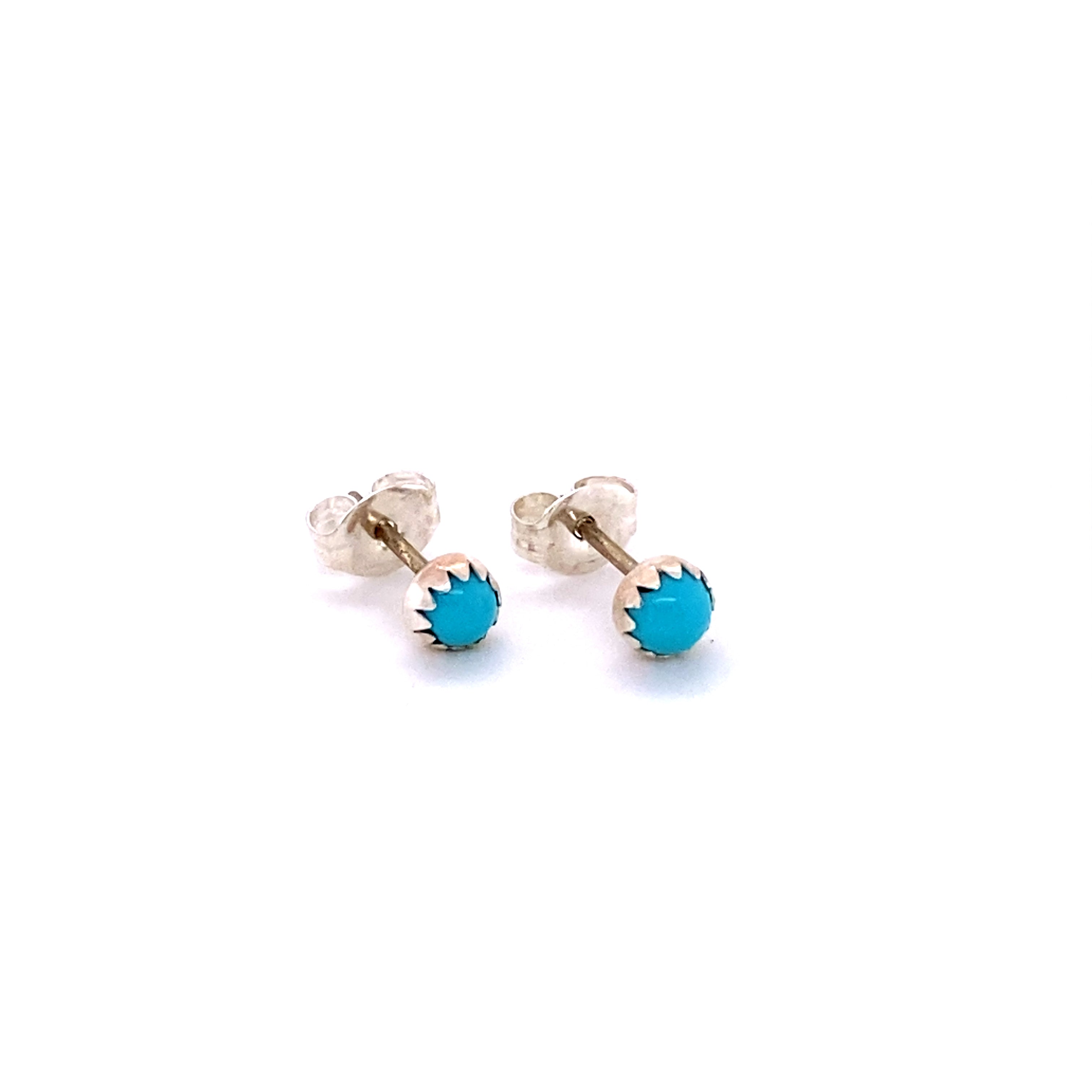 A pair of Super Silver turquoise stud earrings on a white background, made with Sterling Silver.