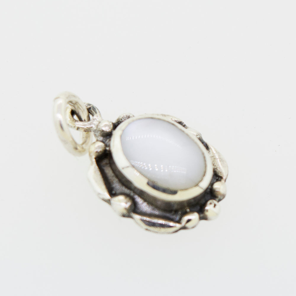 
                  
                    A Beautiful Oval Stone Pendant With Silver Border by Super Silver on a white background.
                  
                