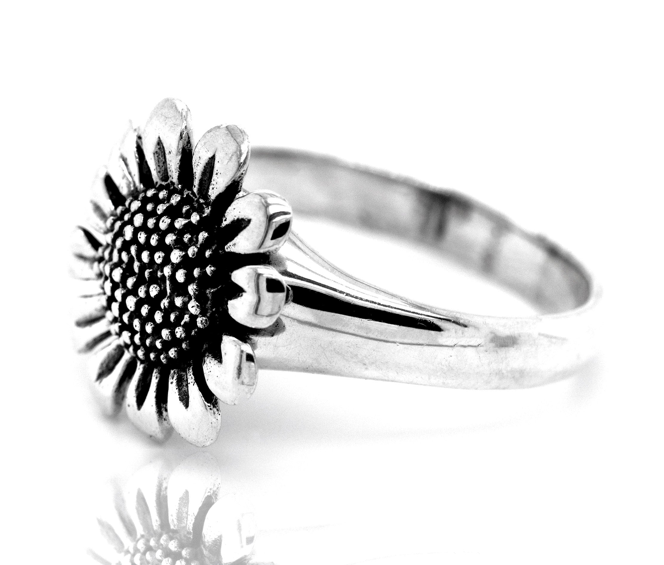 A sterling silver Bright Sunflower Ring with a boho sunflower design.