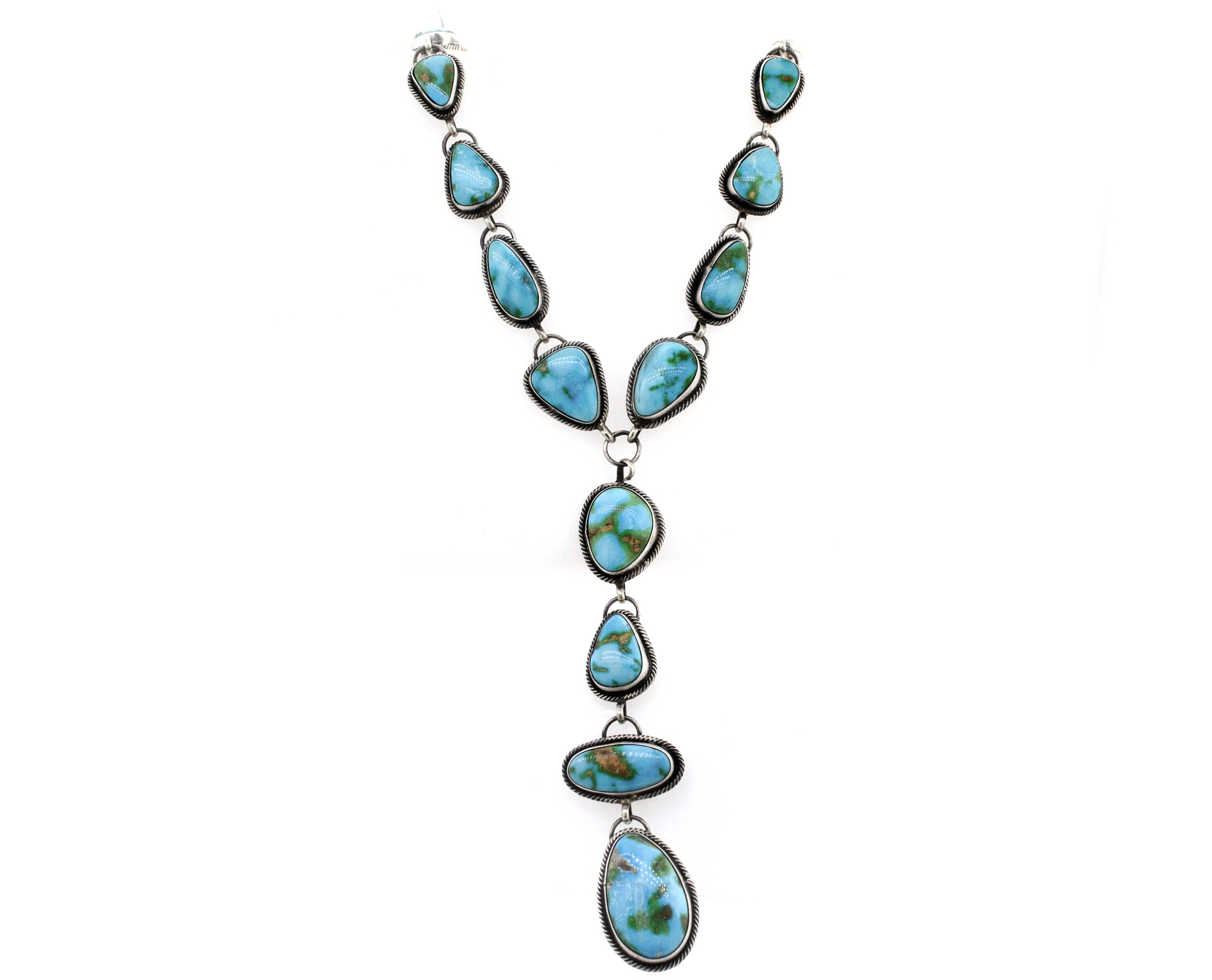 A Stunning Sonora Gold Lariat Necklace And Earrings Set by Super Silver, with Sonora gold turquoise stones on a white background.