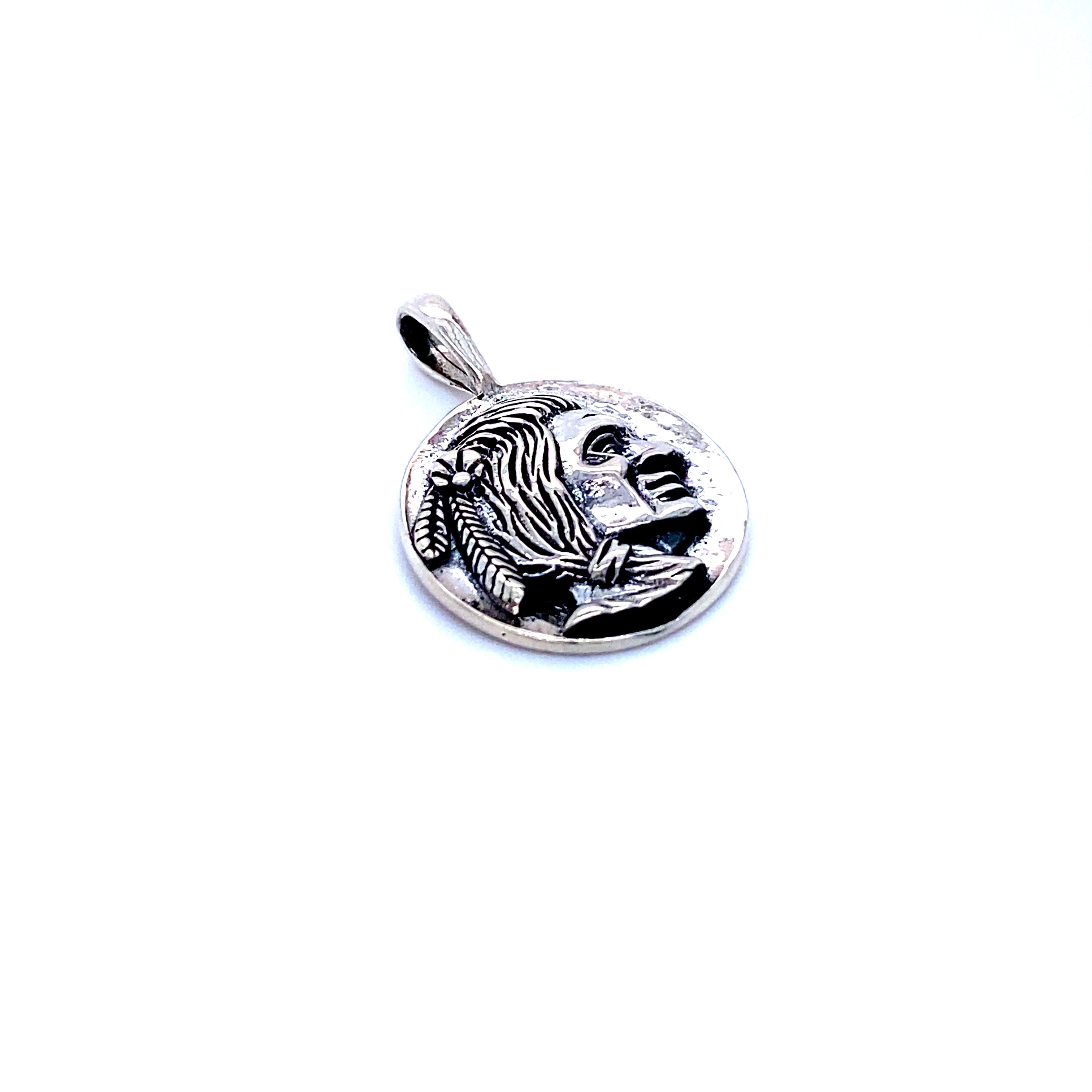 A Super Silver Native Head Coin Charm pendant, perfect for layering.