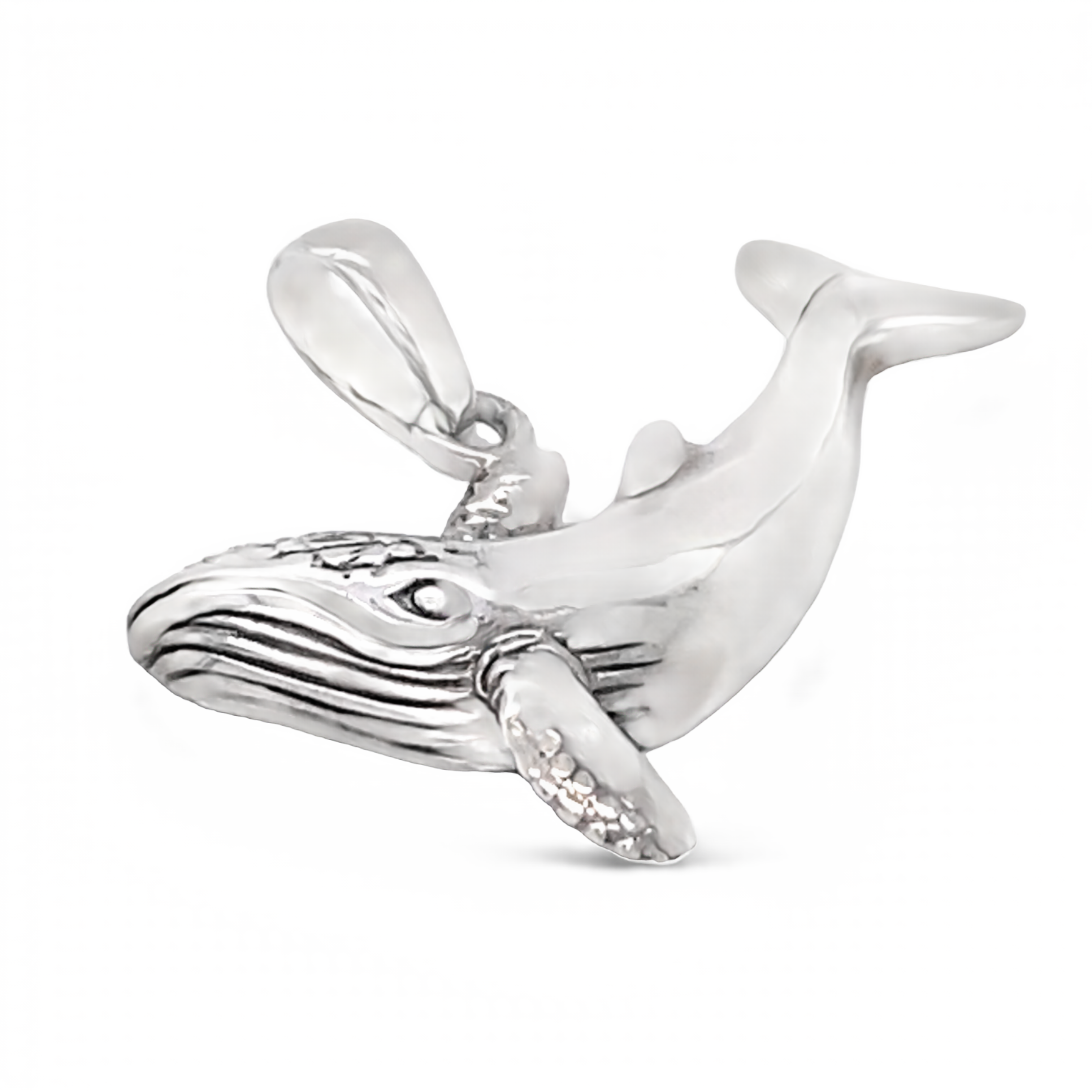 A Super Silver whale pendant on a white background.