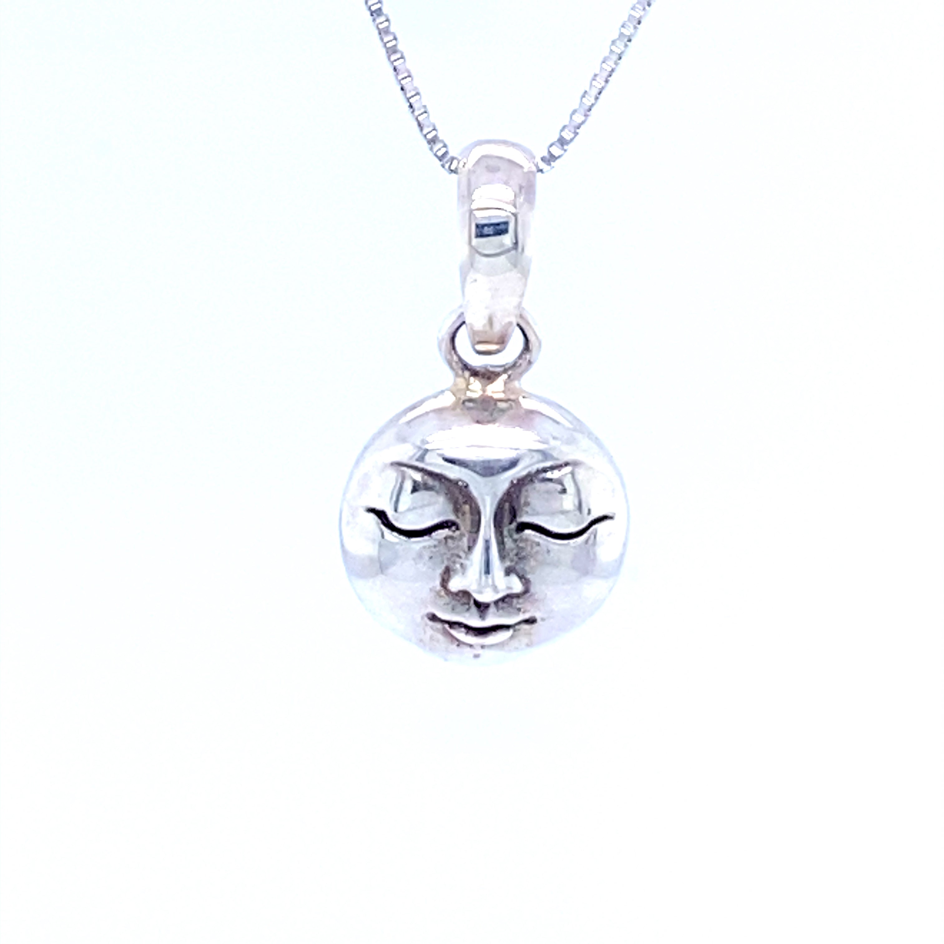 A Small Moon Goddess Pendant featuring a moon face, perfect for those fascinated by celestial bodies, from Super Silver.