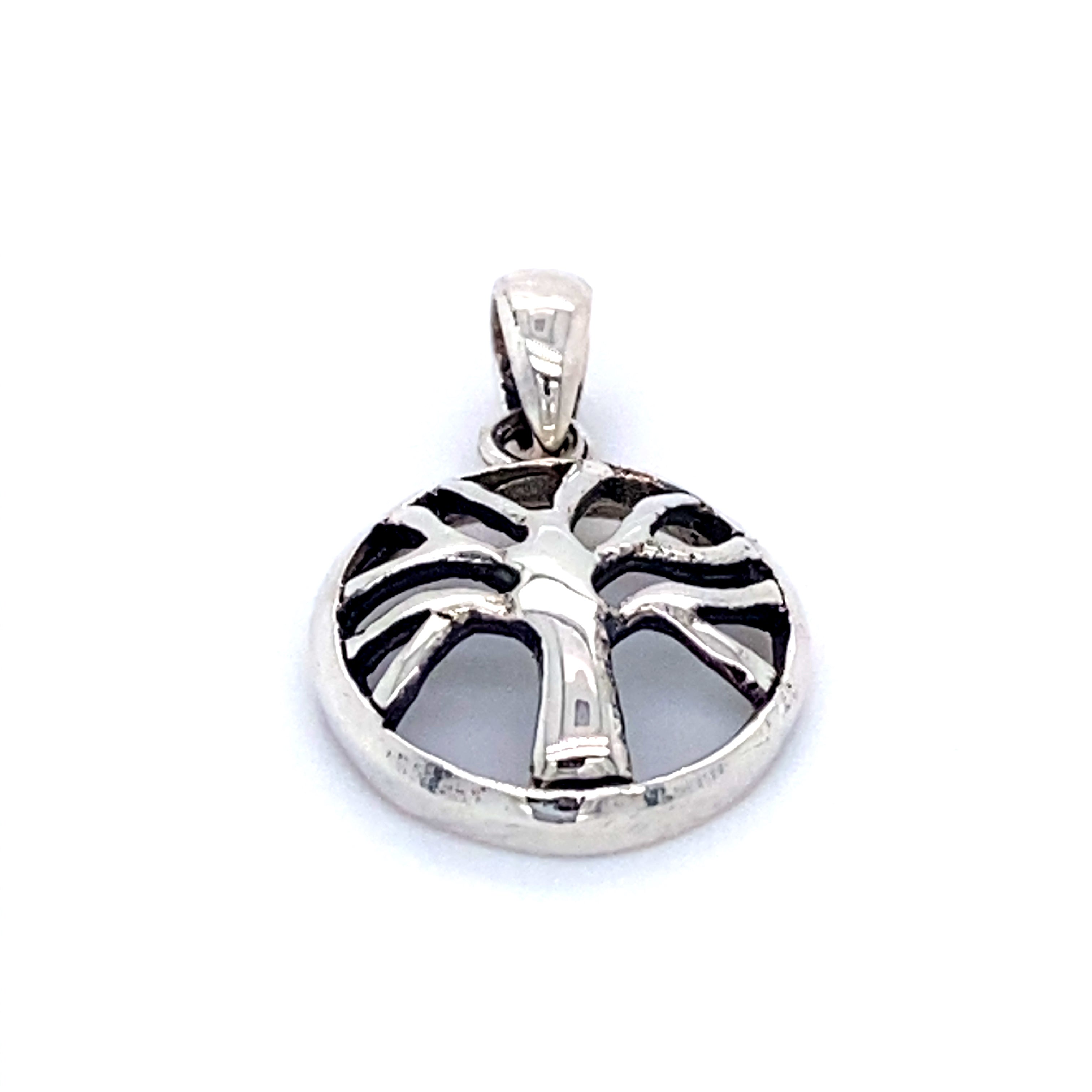A Super Silver Small Round Tree of Life Pendant on a white background, symbolizing nature's beauty.