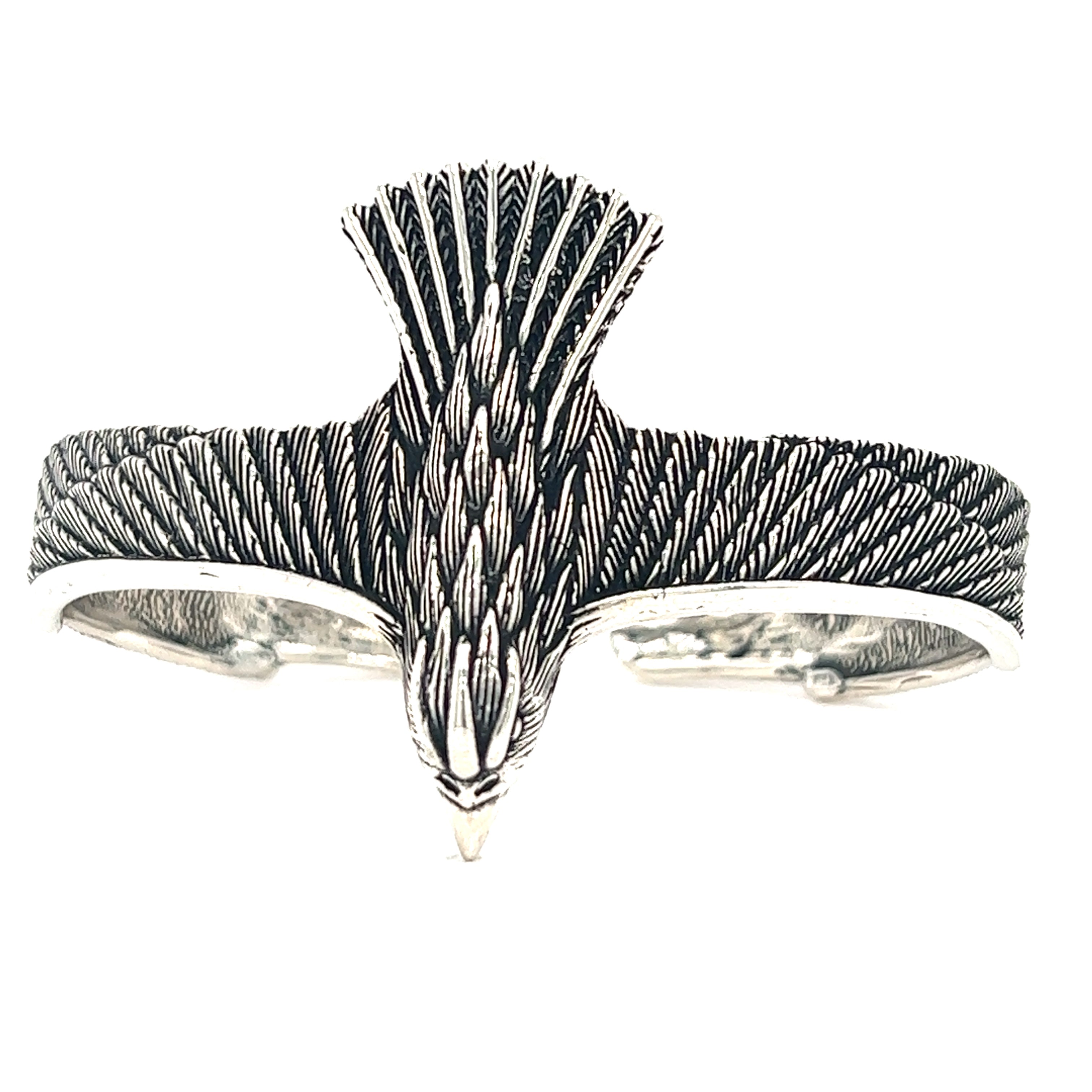 A Unique Raven Cuff from Super Silver, with an oxidized finish, featuring an eagle symbol.