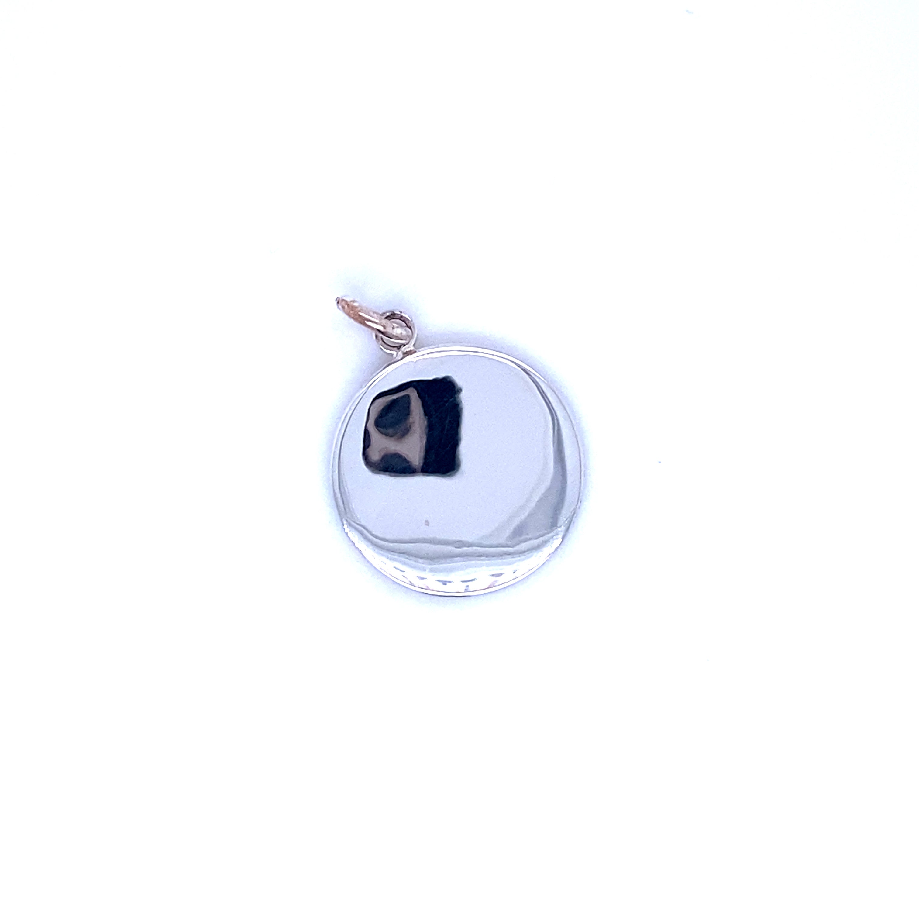An Simple Round Engravable Pendant with a black circle on it by Super Silver.