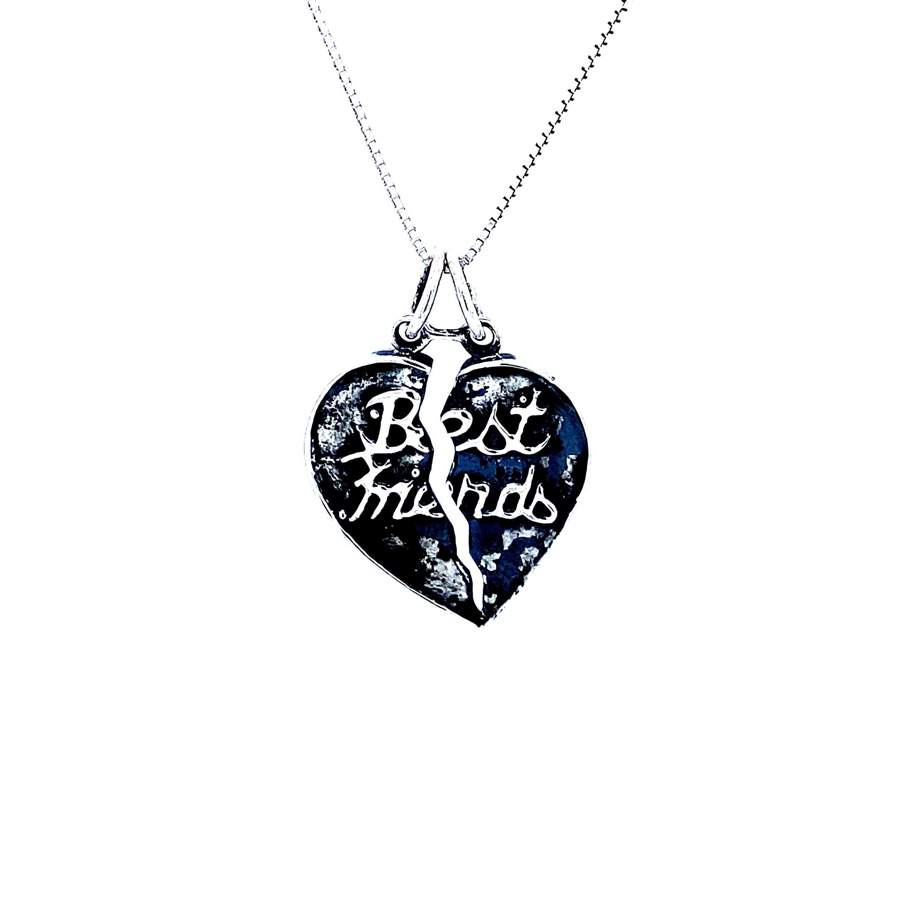 A Super Silver "Best Friends" Break Apart Charm necklace, serving as an affirmation of everlasting bond.