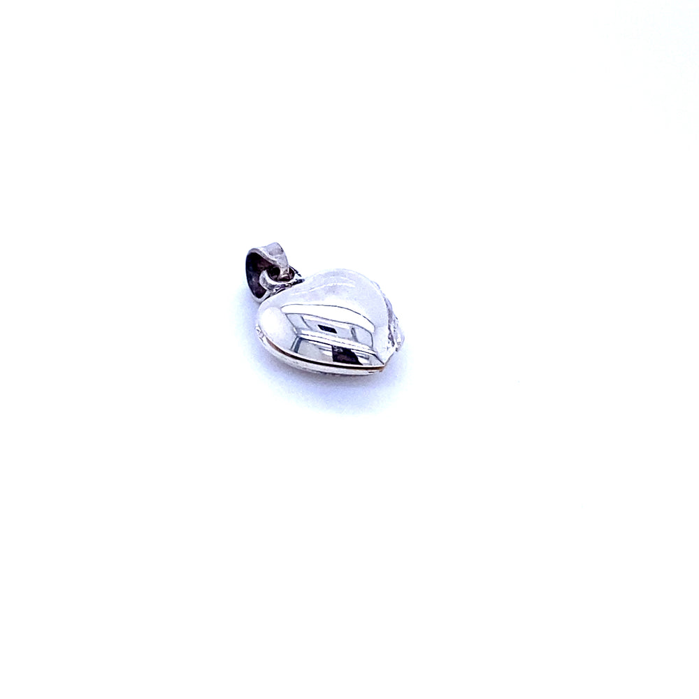 A Super Silver Dainty Heart Locket pendant on a white background.