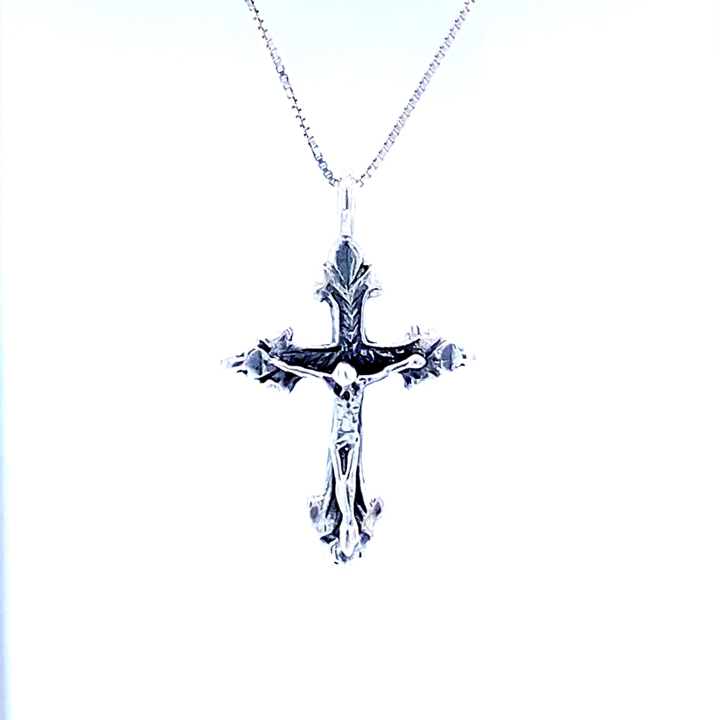Ornate Crucifix Charm pendant with vintage appeal in Super Silver sterling silver.
