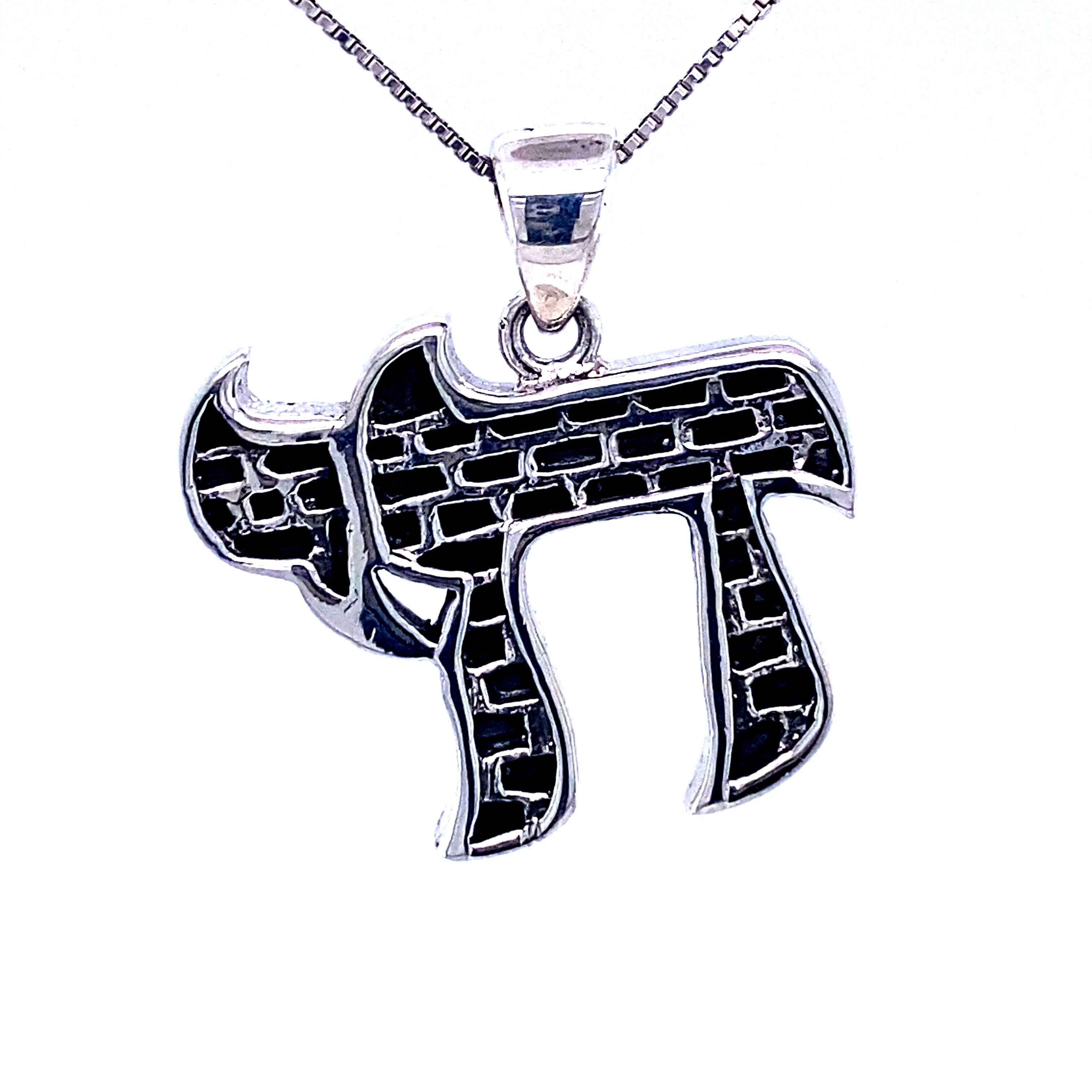 A Super Silver Chai Symbol Pendant with Brick Pattern celebrating Jewish heritage.