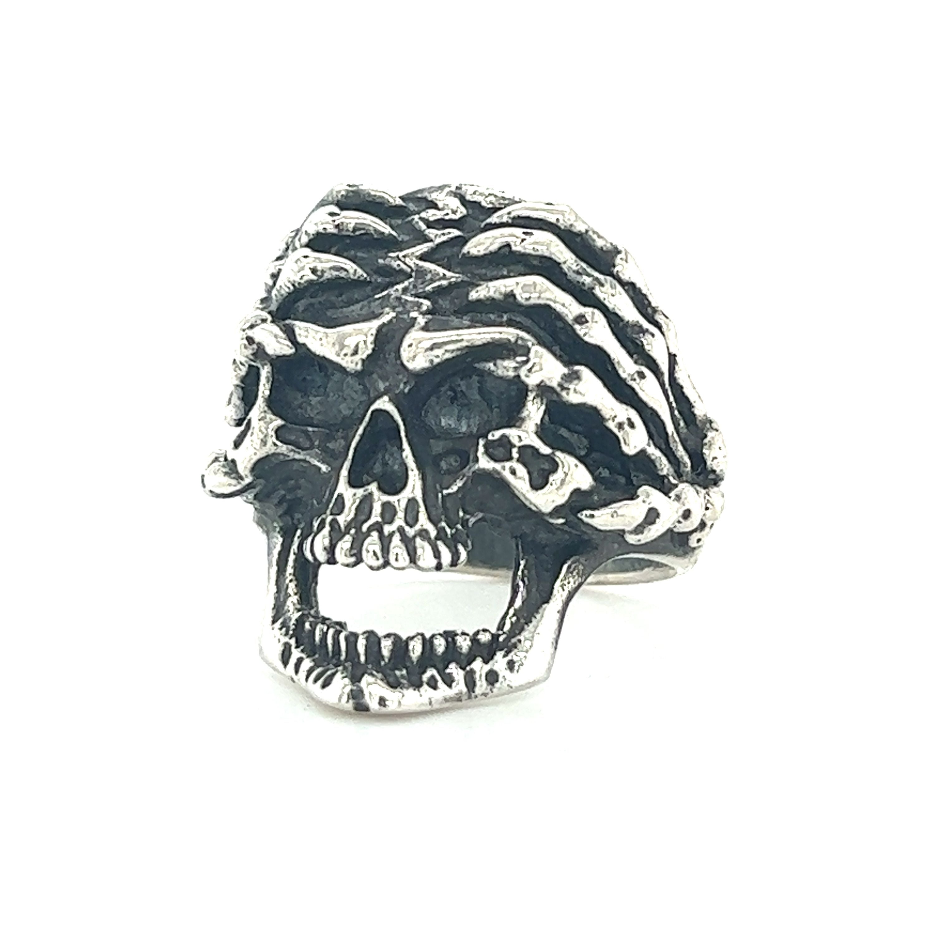 A mens Screaming Skull Ring with a skull and crossbones design.
