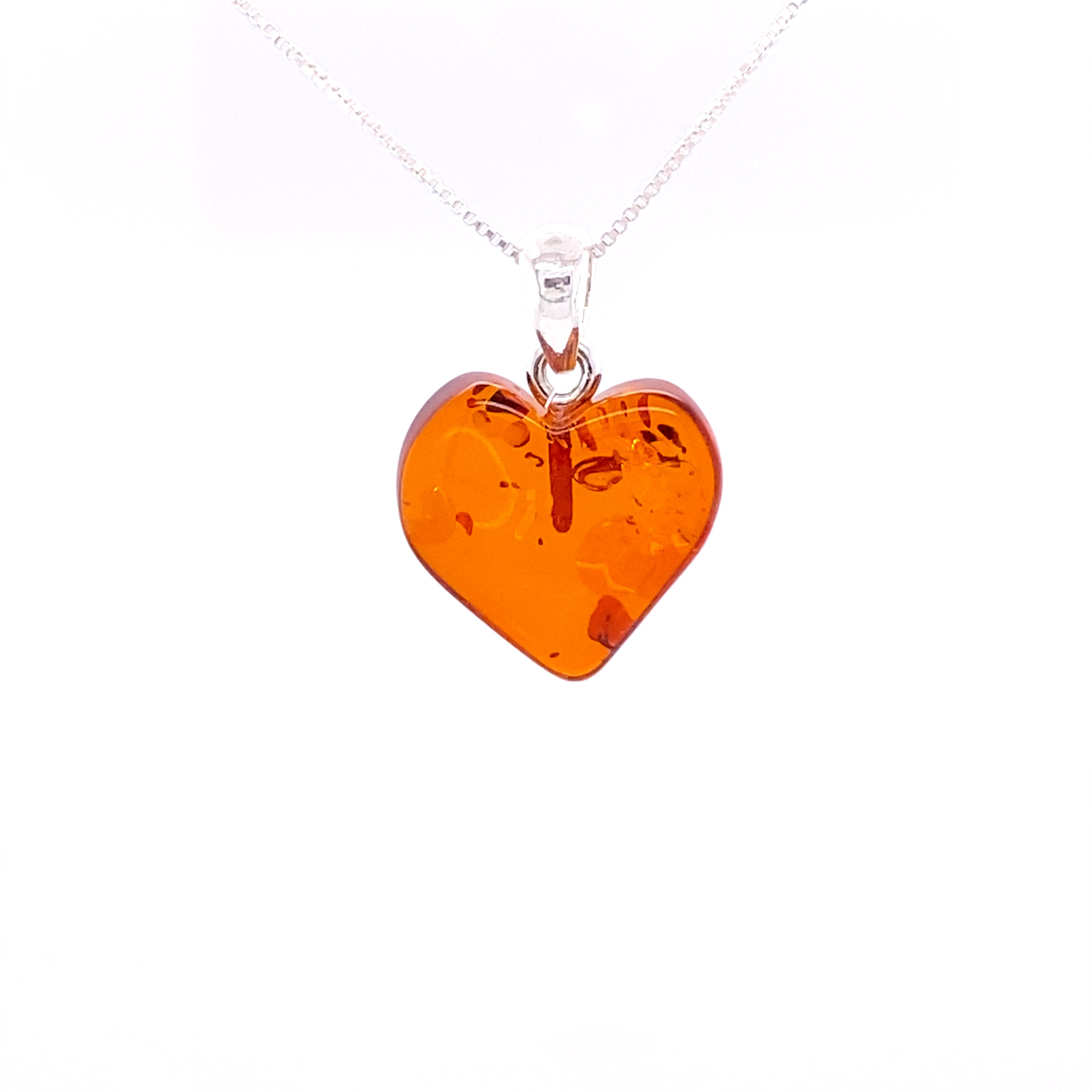 A Charming Baltic Amber Heart Pendant on a Super Silver .925 Sterling Silver chain.