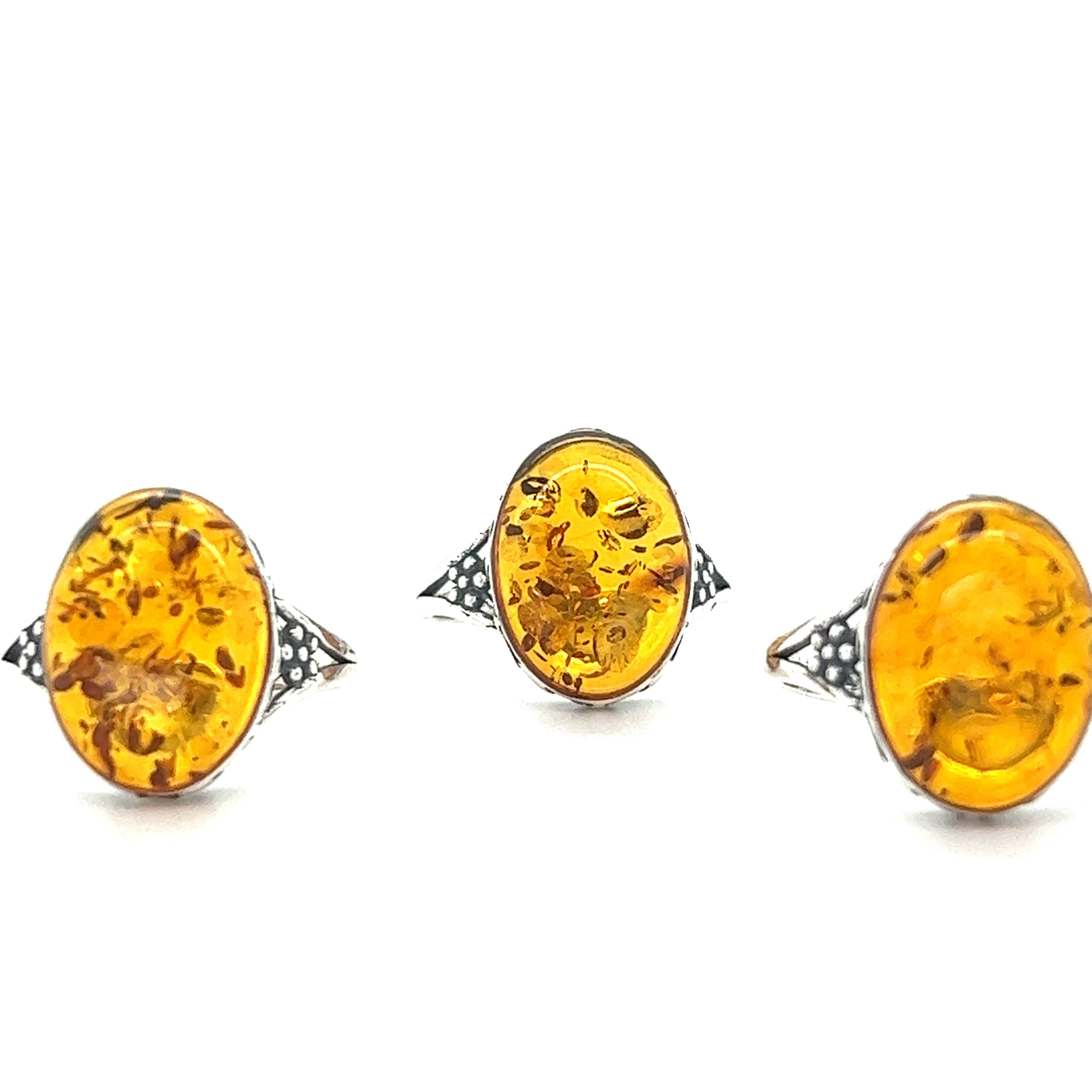 Three Super Silver boho chic rings made of Baltic Amber Ring with Victorian Styled Floral Setting.