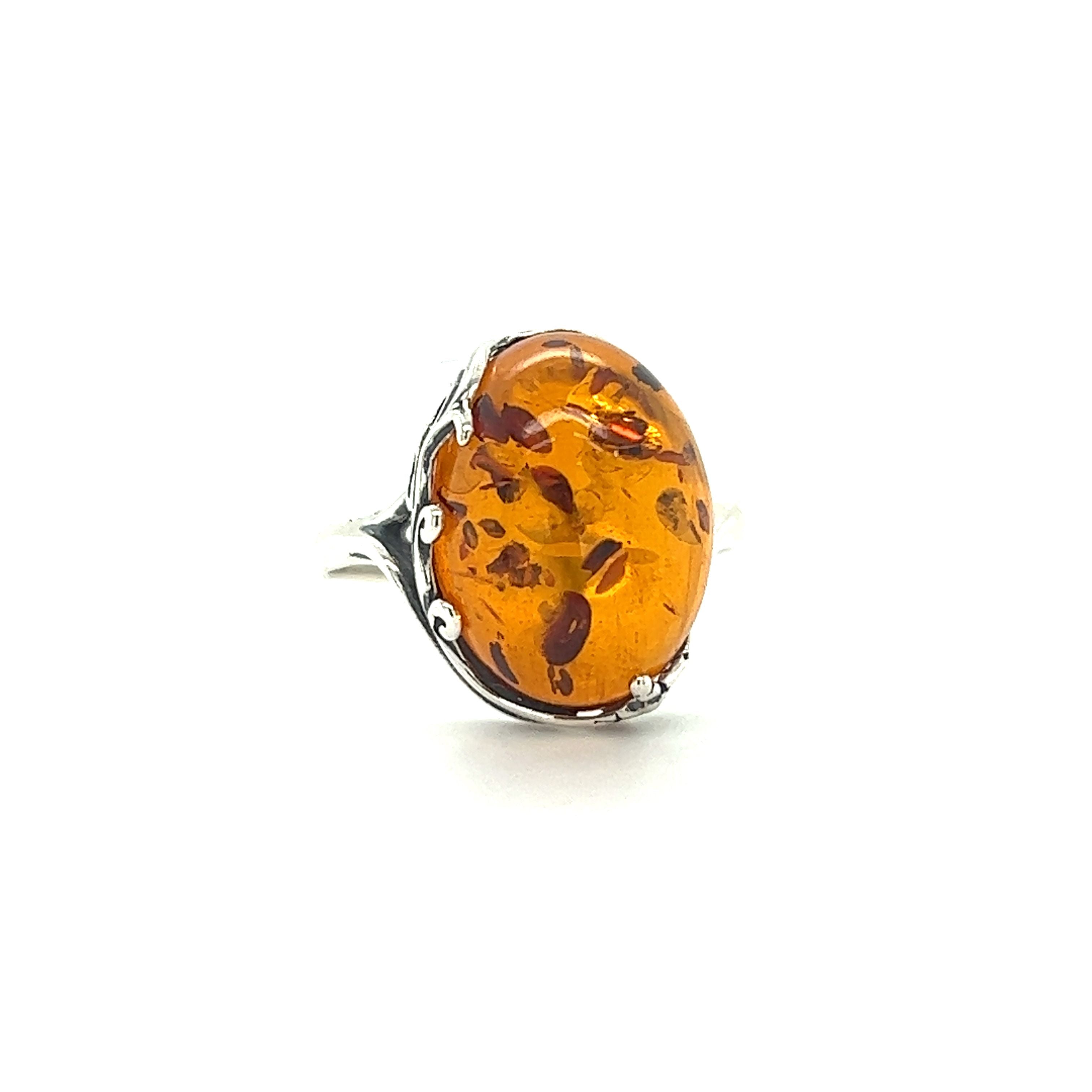 Stunning Victorian Styled Amber Ring by Super Silver with earthy stone.