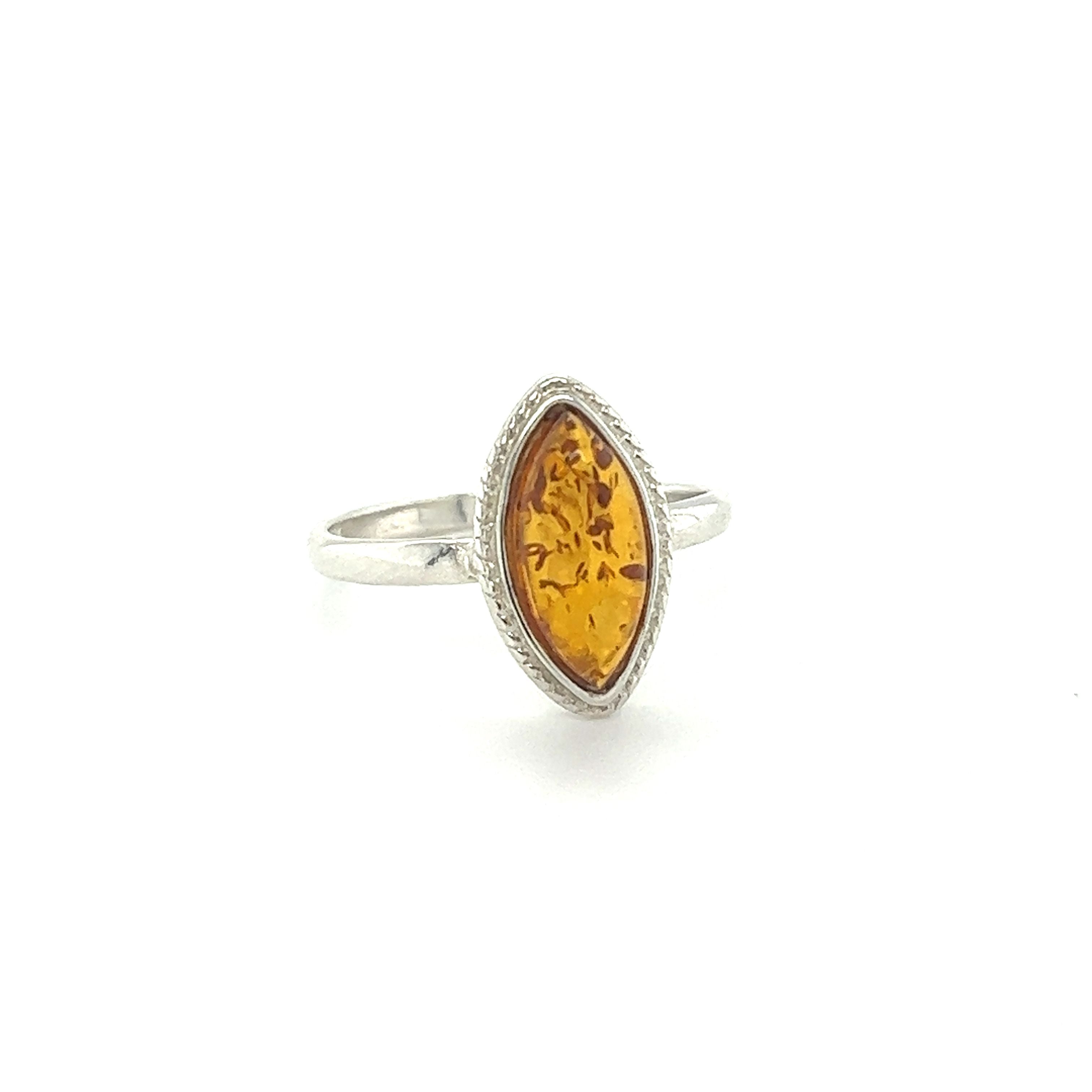 An exquisite Super Silver Marquise Baltic Amber Ring with Delicate Rope Border.