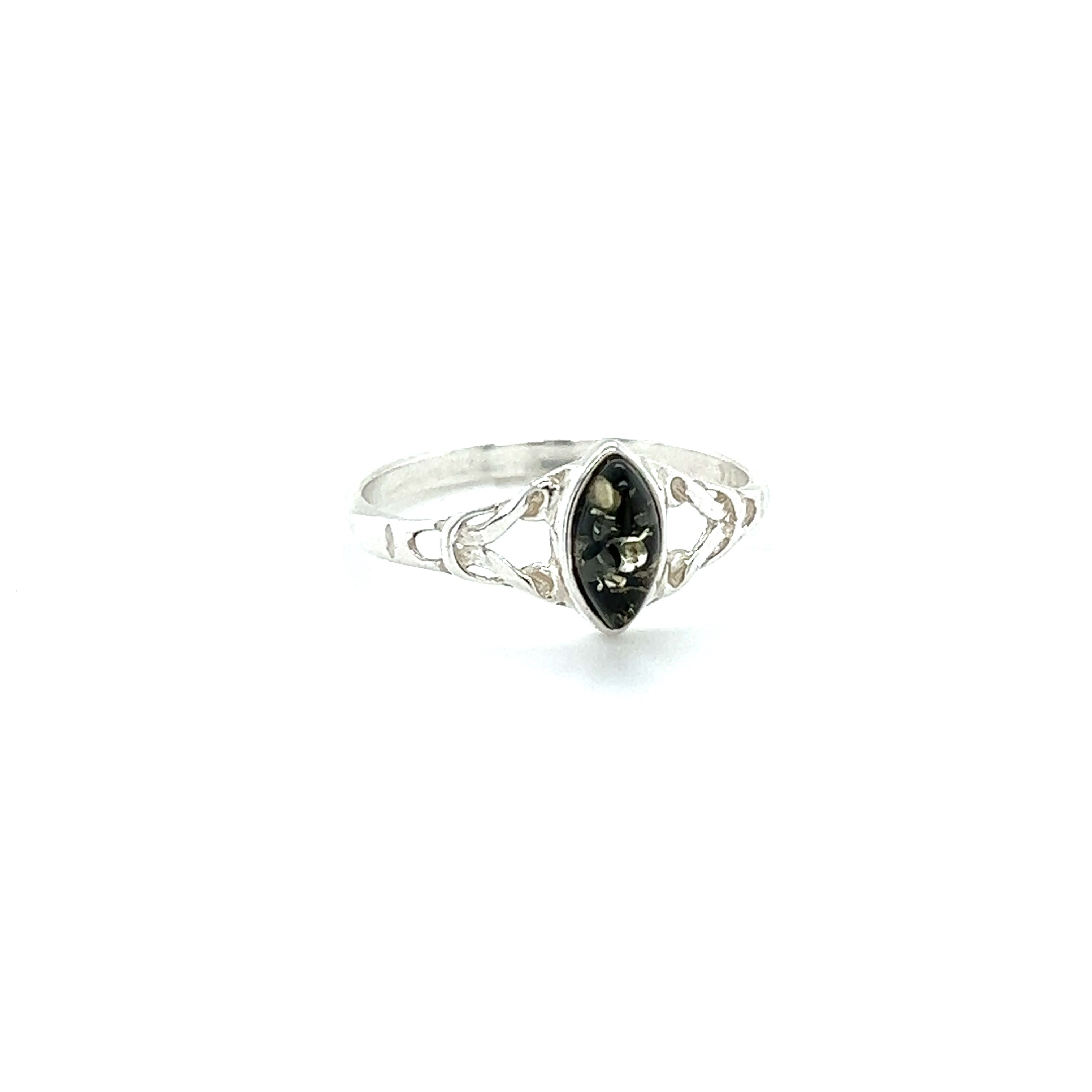 A Delicate Celtic Inspired Amber Ring from Super Silver with a black stone for healing and spiritual growth.