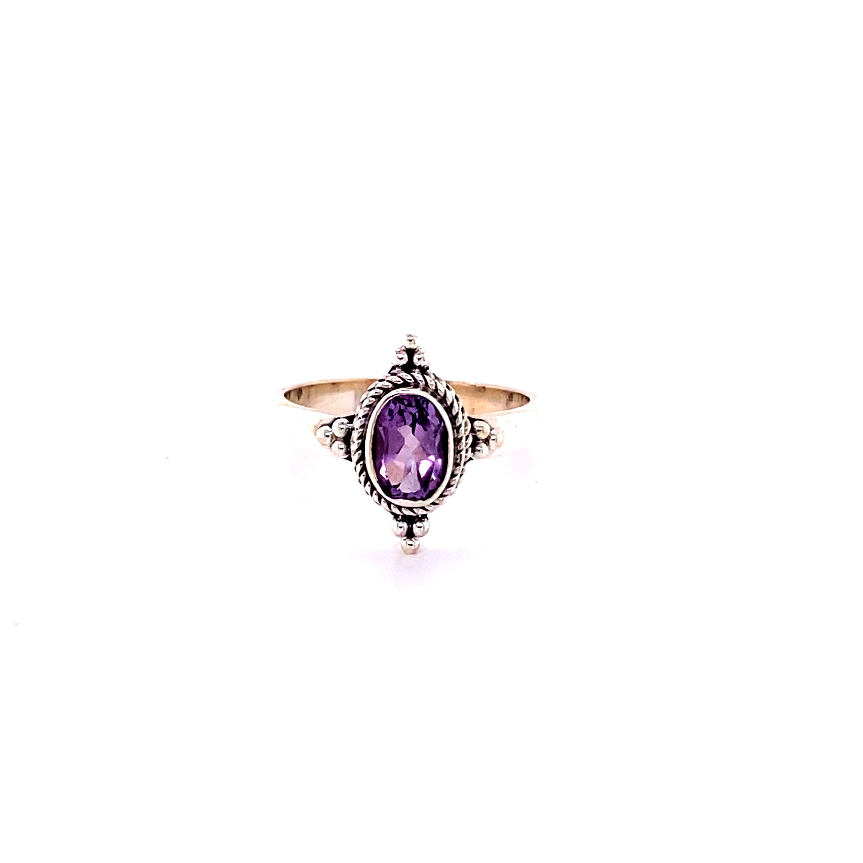 Four Points Gemstone Ring with diamond accents.