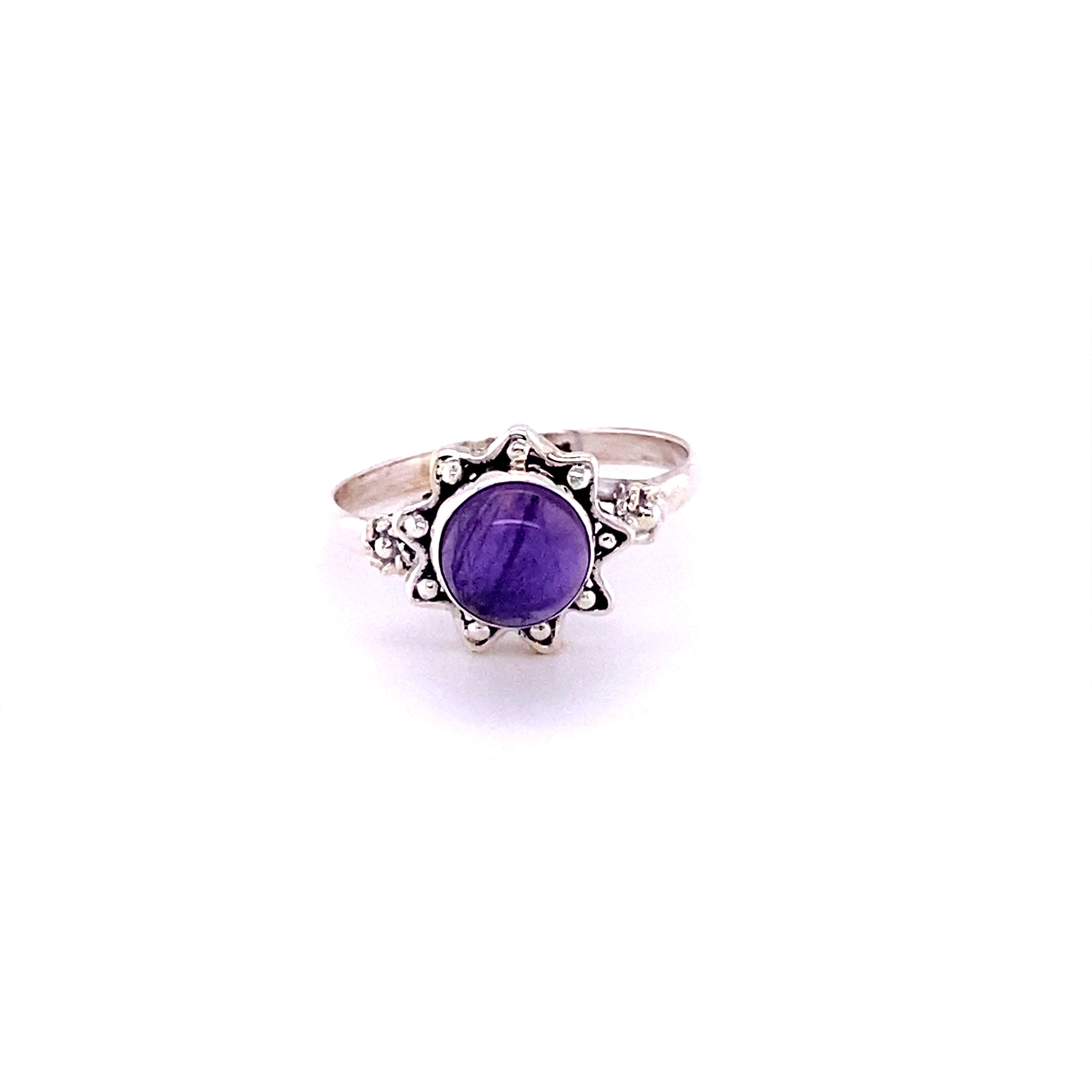 A Flower Ring with Natural Round Gemstone on a white background with a sterling silver band.