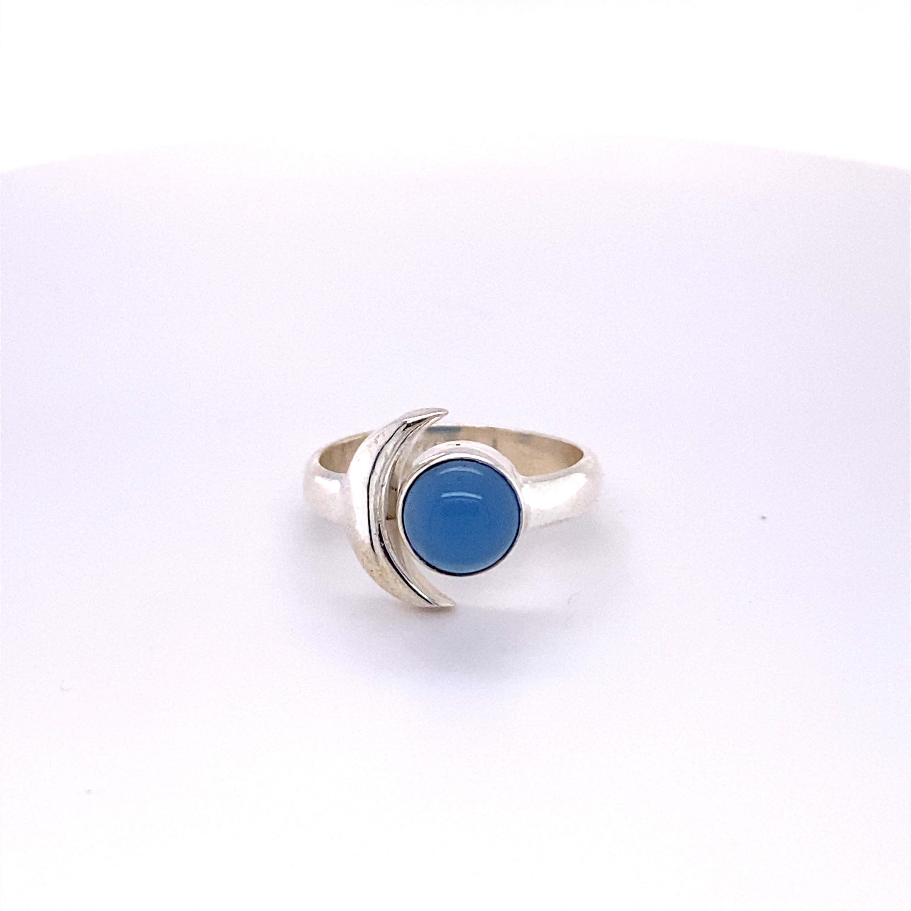 A Crescent Moon Ring with Natural Gemstones.