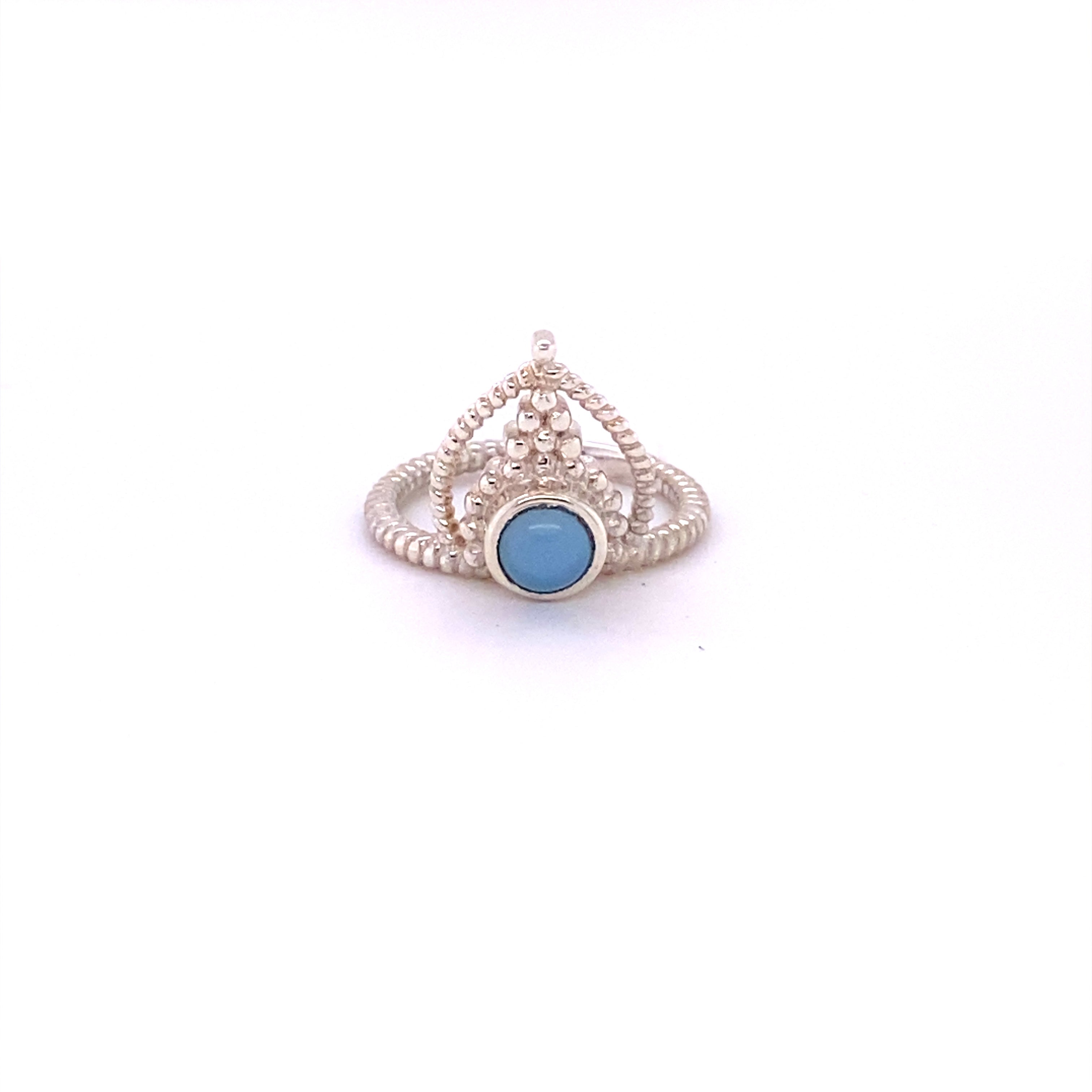 A boho-inspired Simple Tiara Ring with Natural Gemstones adorned with a vibrant turquoise stone.